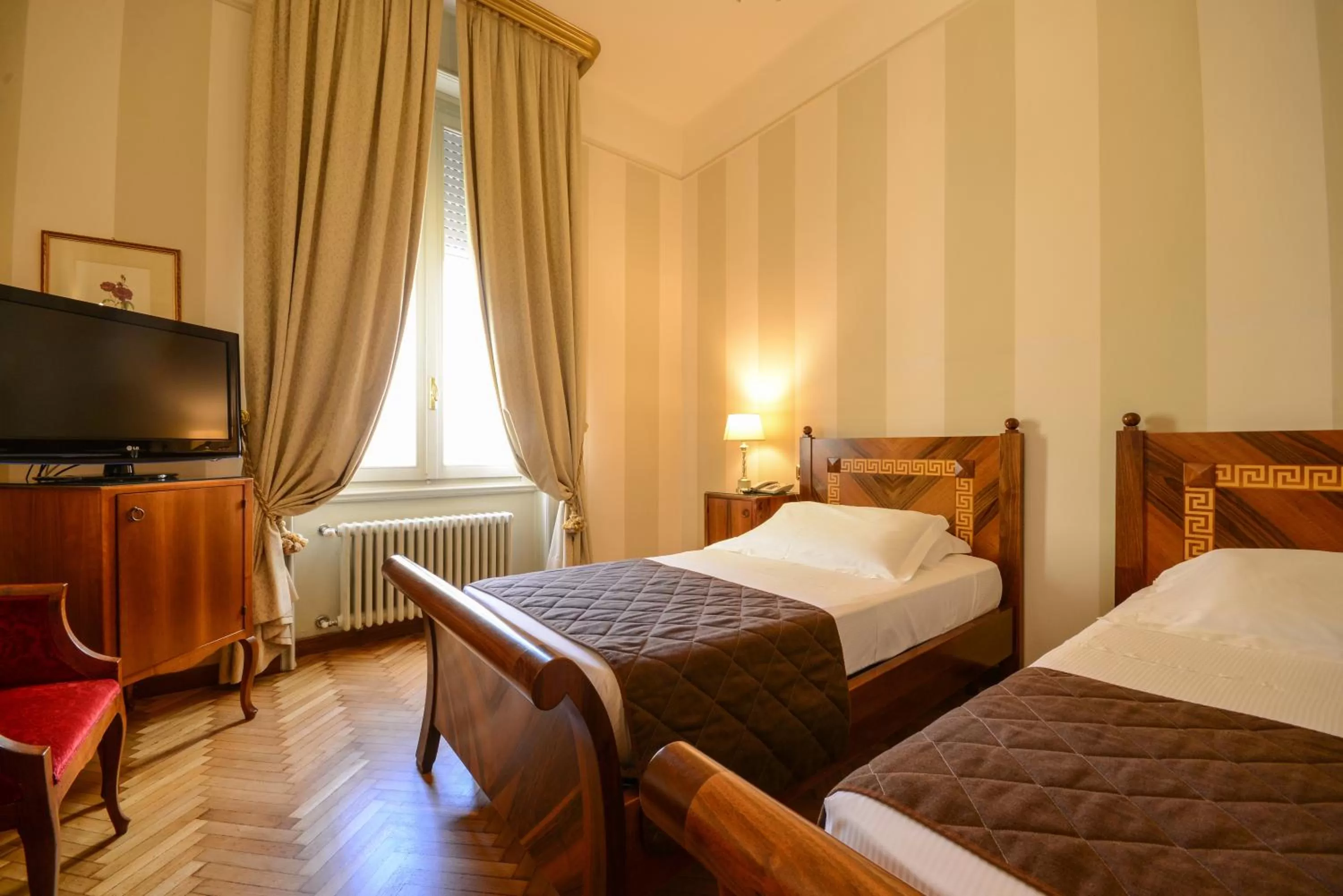 Bed in Hotel Vittoria