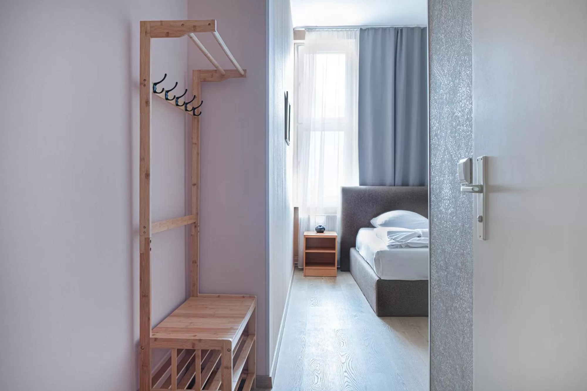 Photo of the whole room, Bed in Hotel BELLEVUE am Kurfürstendamm