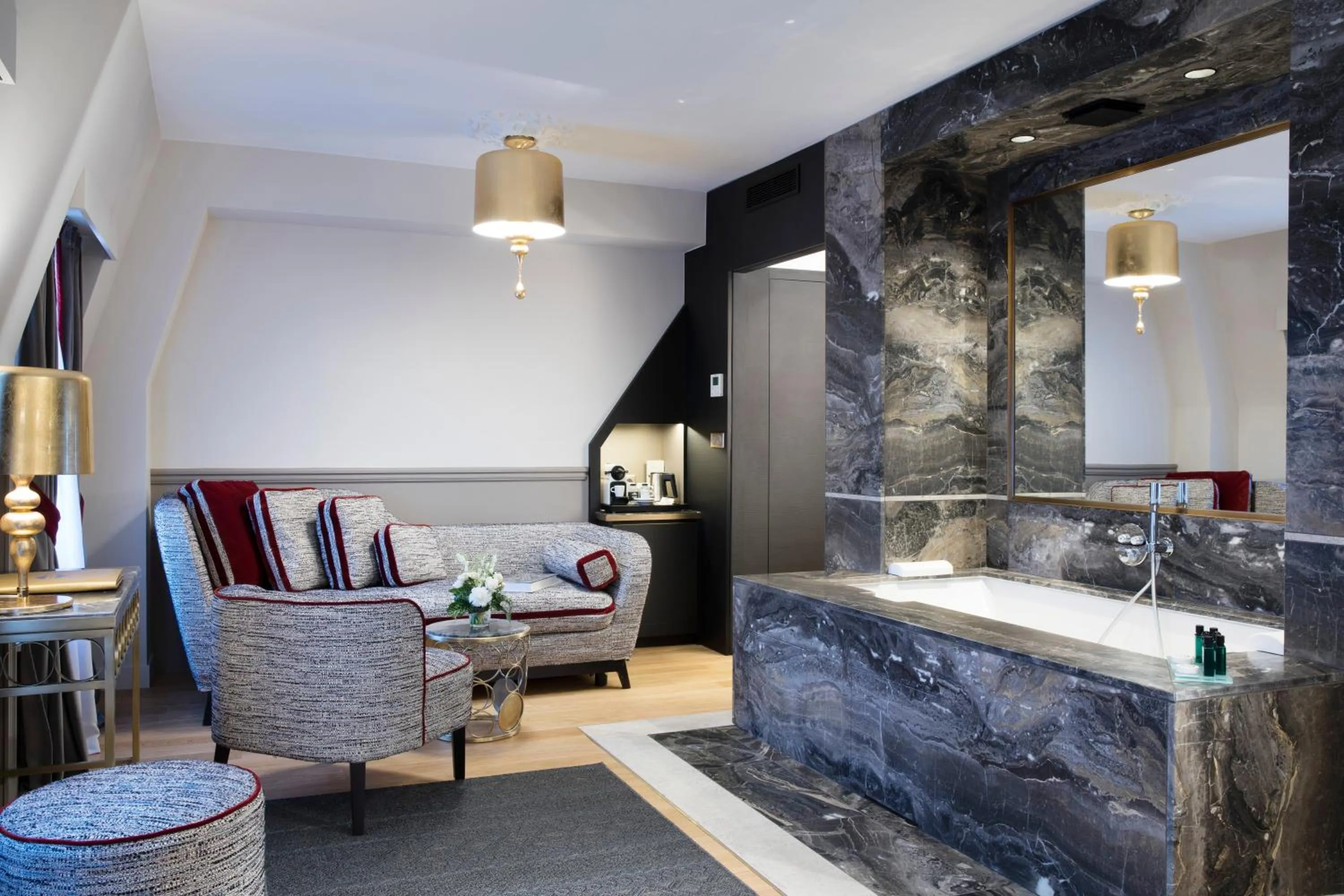 Seating area in Hotel Lumen Paris Louvre