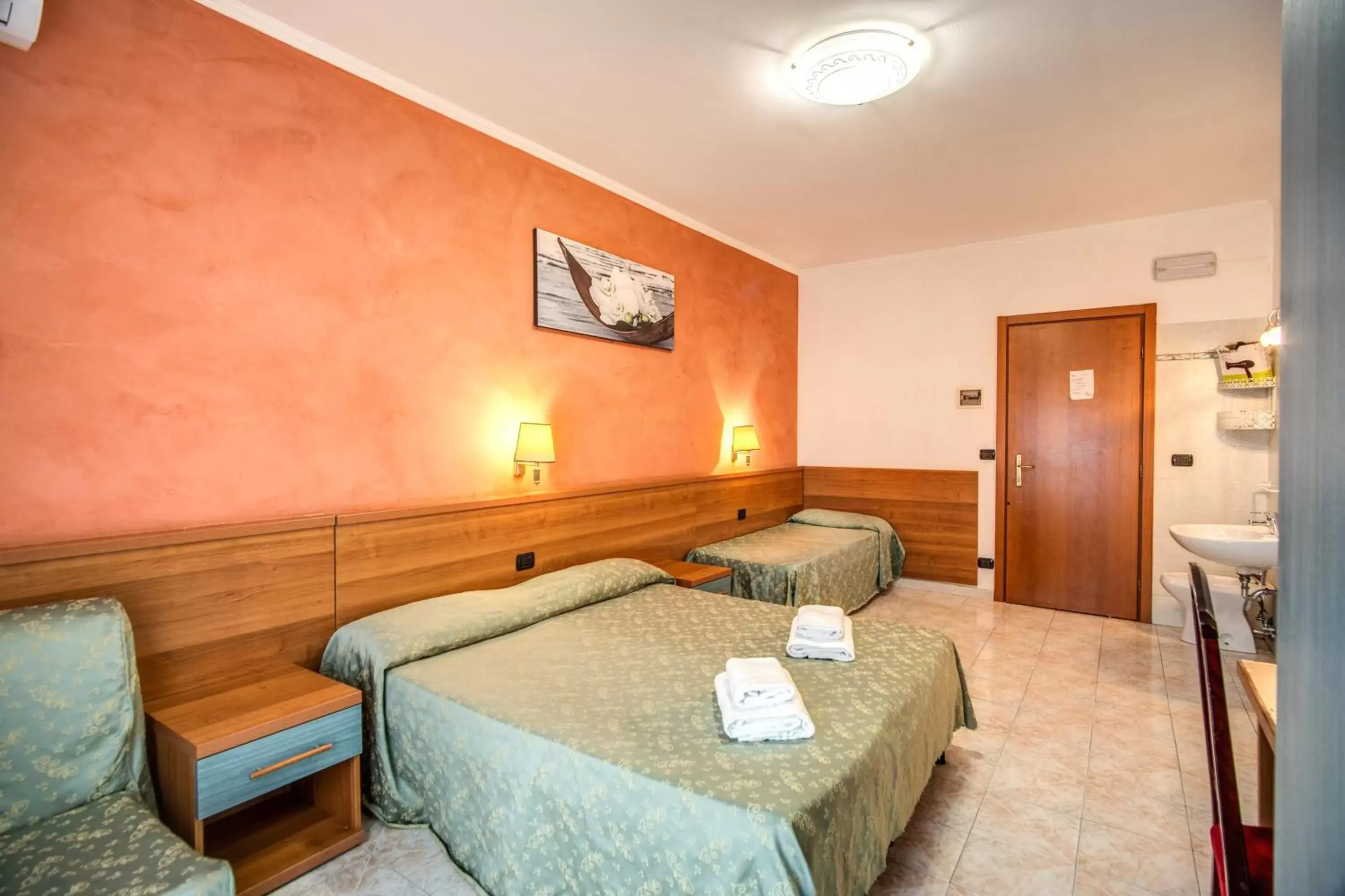 Triple Room with Private External Bathroom in Hotel Millerose Triple Room with Private External Bathroom in Hotel Millerose