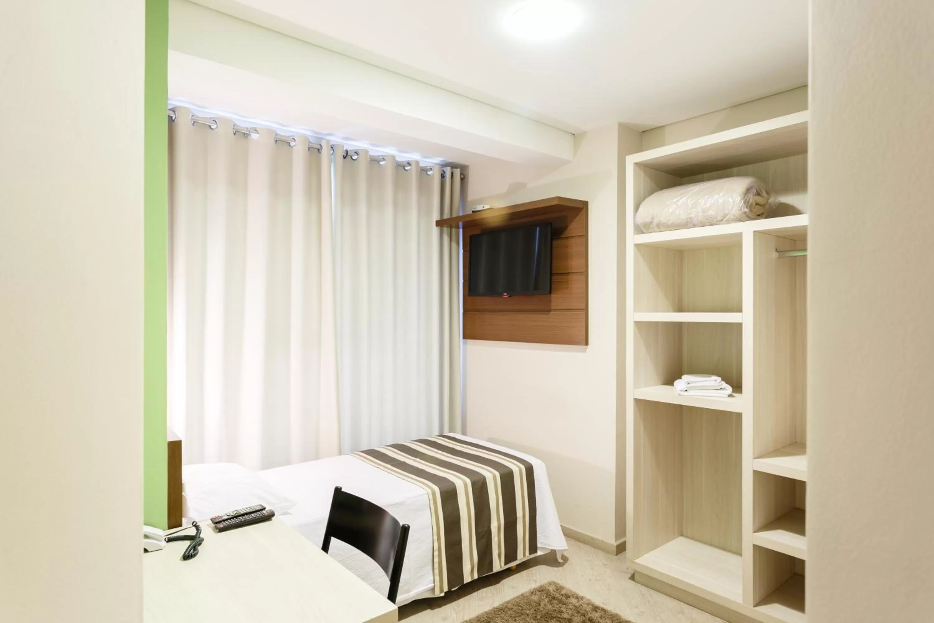 TV/Entertainment Center in Hotel Sol By MRHotelaria