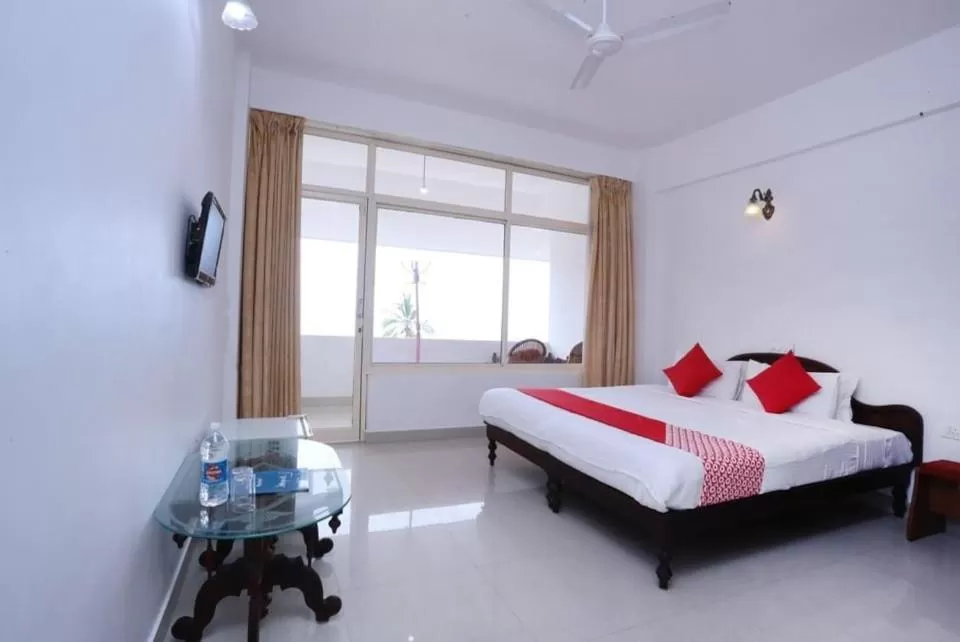 Photo of the whole room, Bed in Swapnatheeram Beach Resort