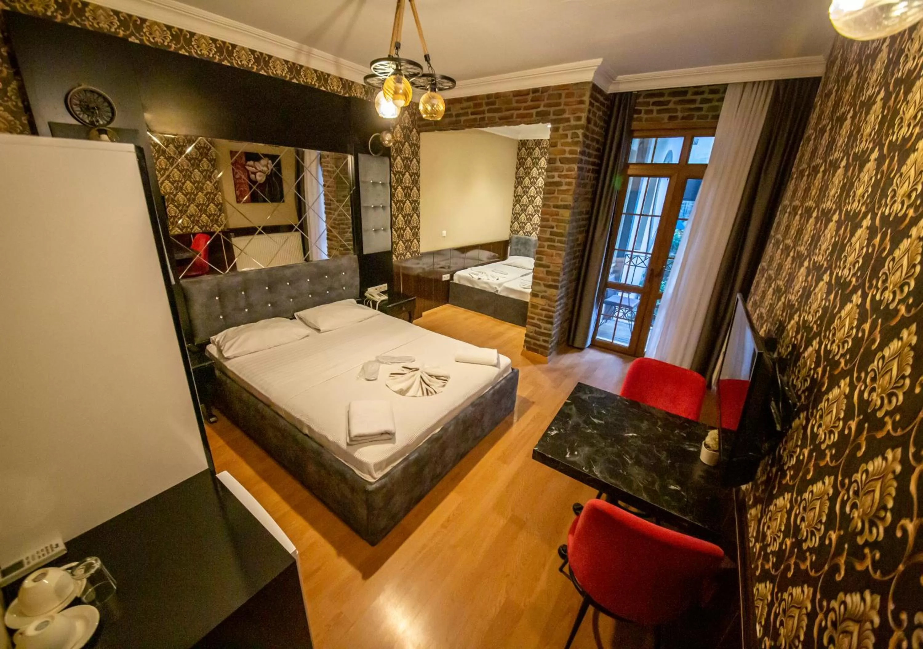 Comfort Quadruple Room in Royal Palace Hotel