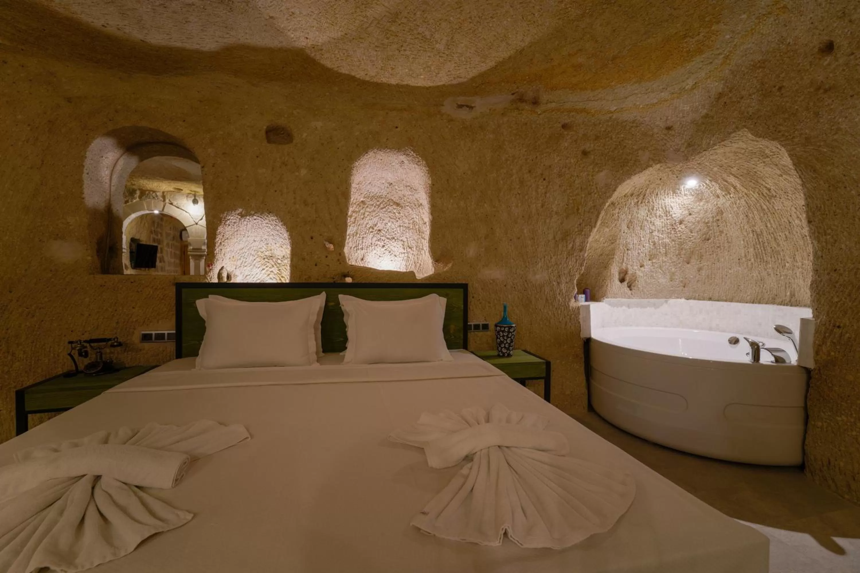 Bed in The Niche Cave Hotel
