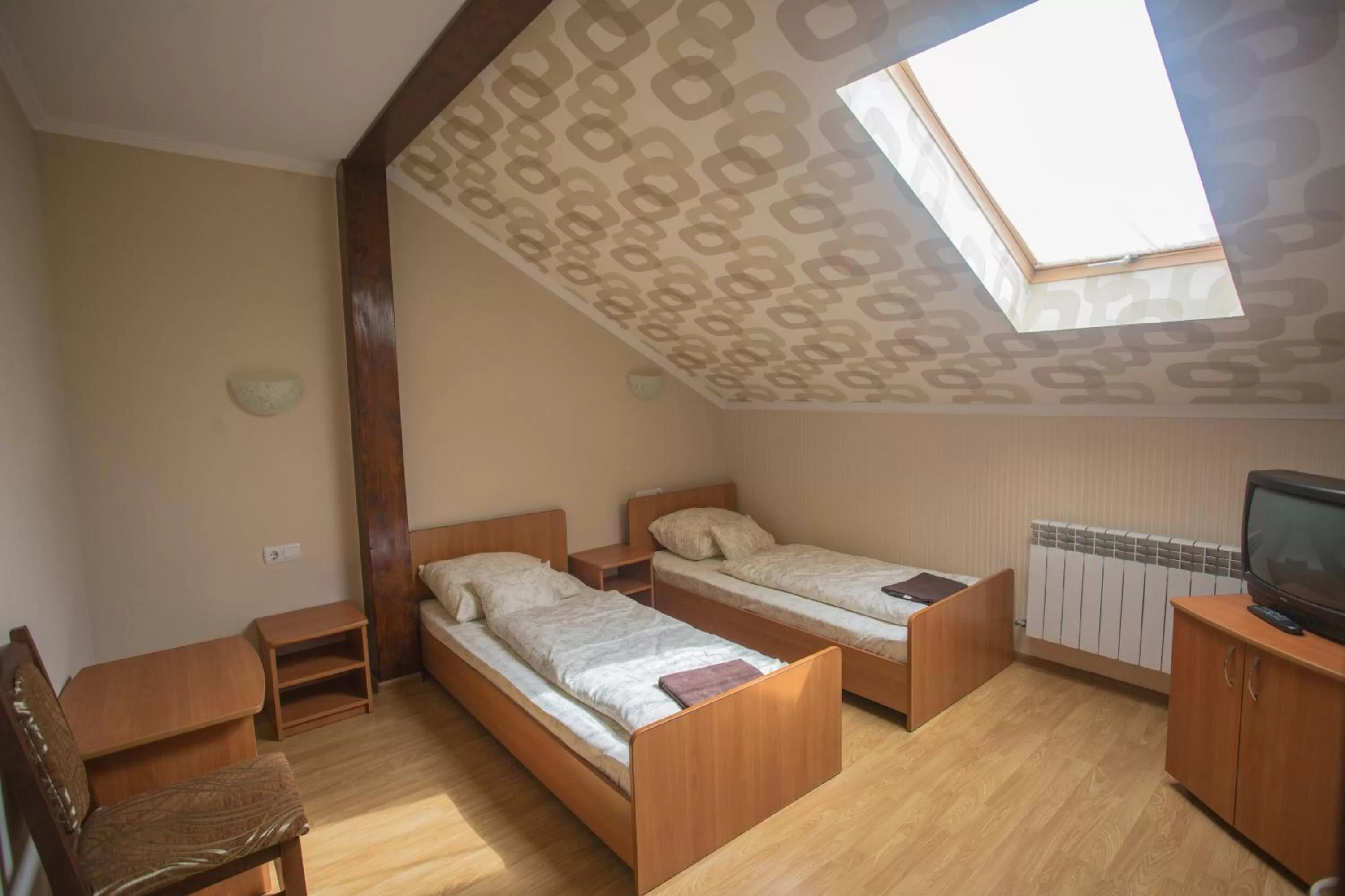 Photo of the whole room, Bed in Praktik Hotel & Restaurant