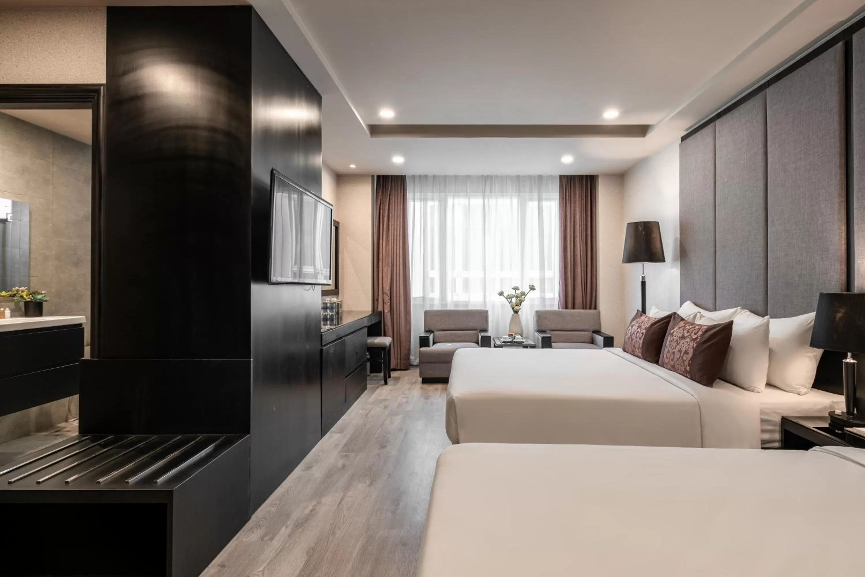 Bed in Paragon Saigon Hotel