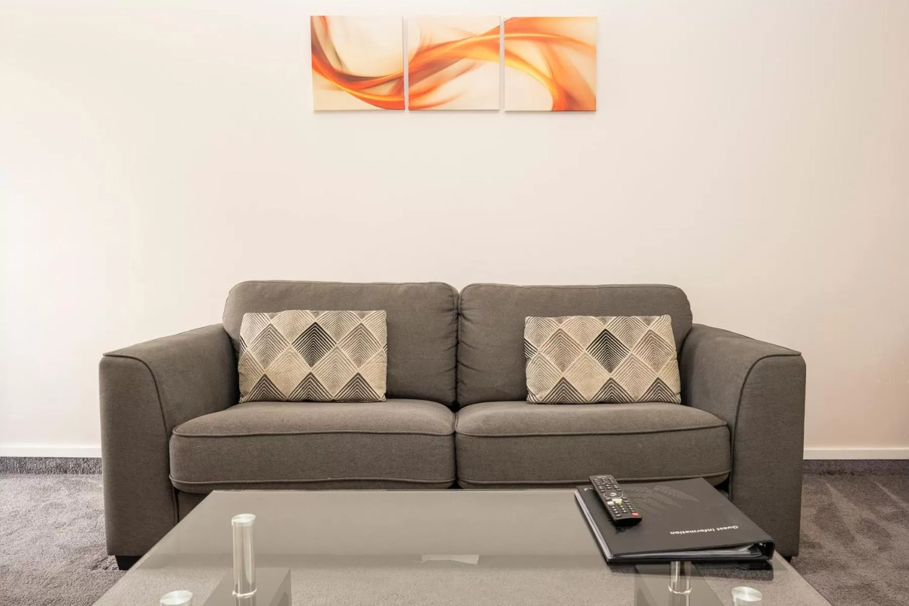 Seating area in Tudor Park Motel Spacious with kitchens 1 minute walk to restaurant and shopping centre and Gisborne Hospital