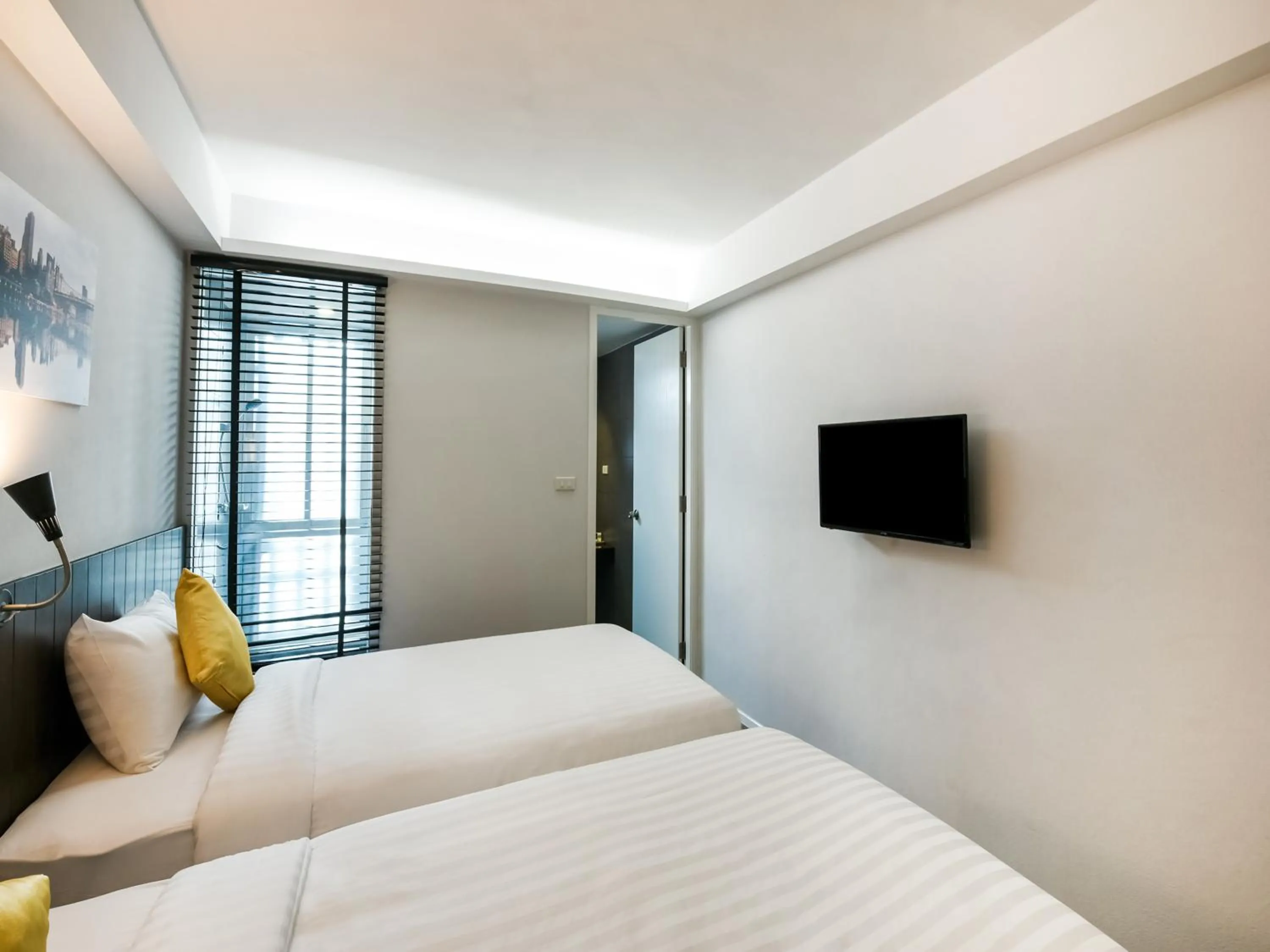 Bed in Kitzio House Hotel Huai Kwang