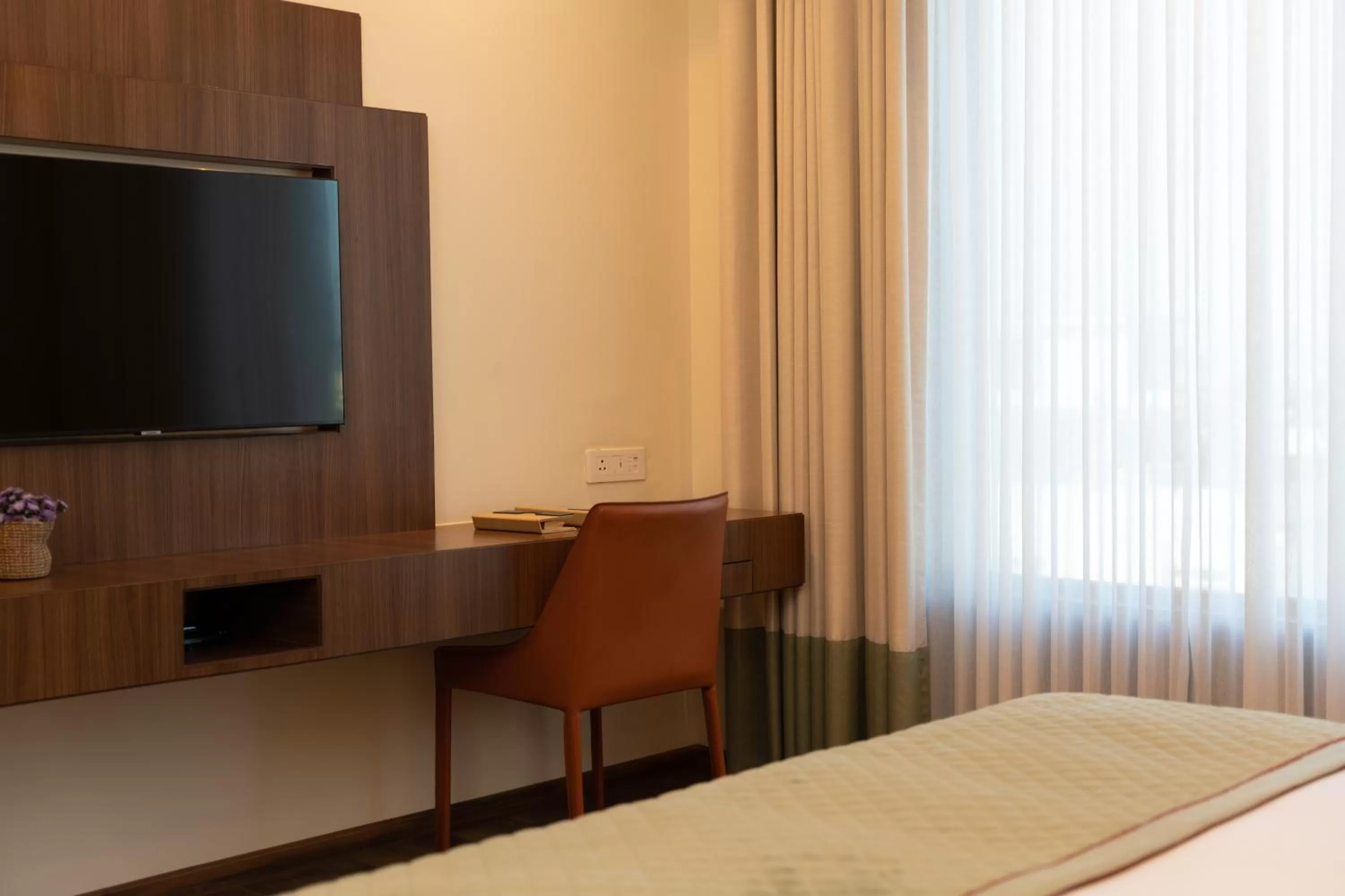 TV and multimedia, Bed in The Greenwood Guwahati - A Luxury Boutique Hotel