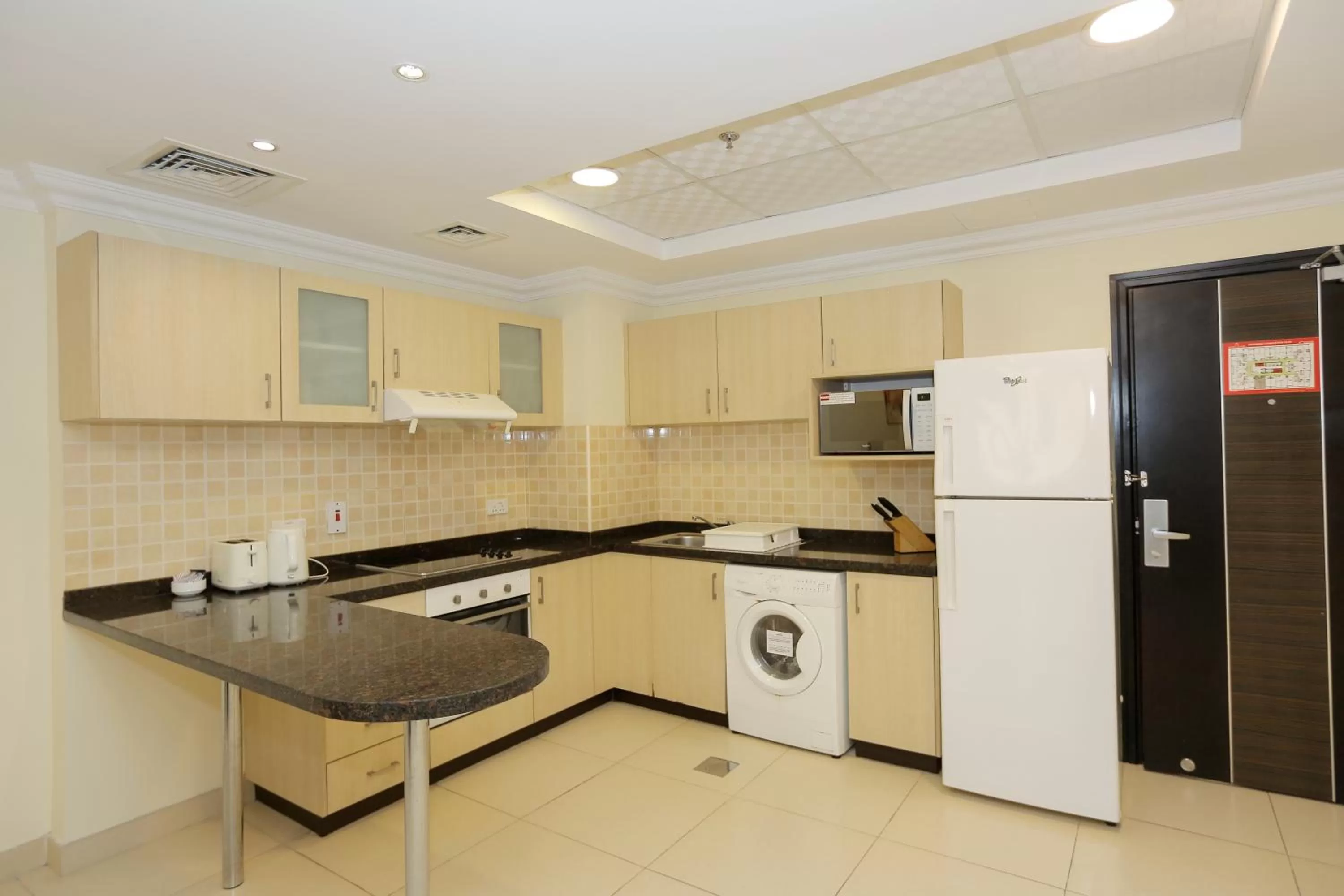 Kitchen or kitchenette in Ivory Grand Hotel Apartments