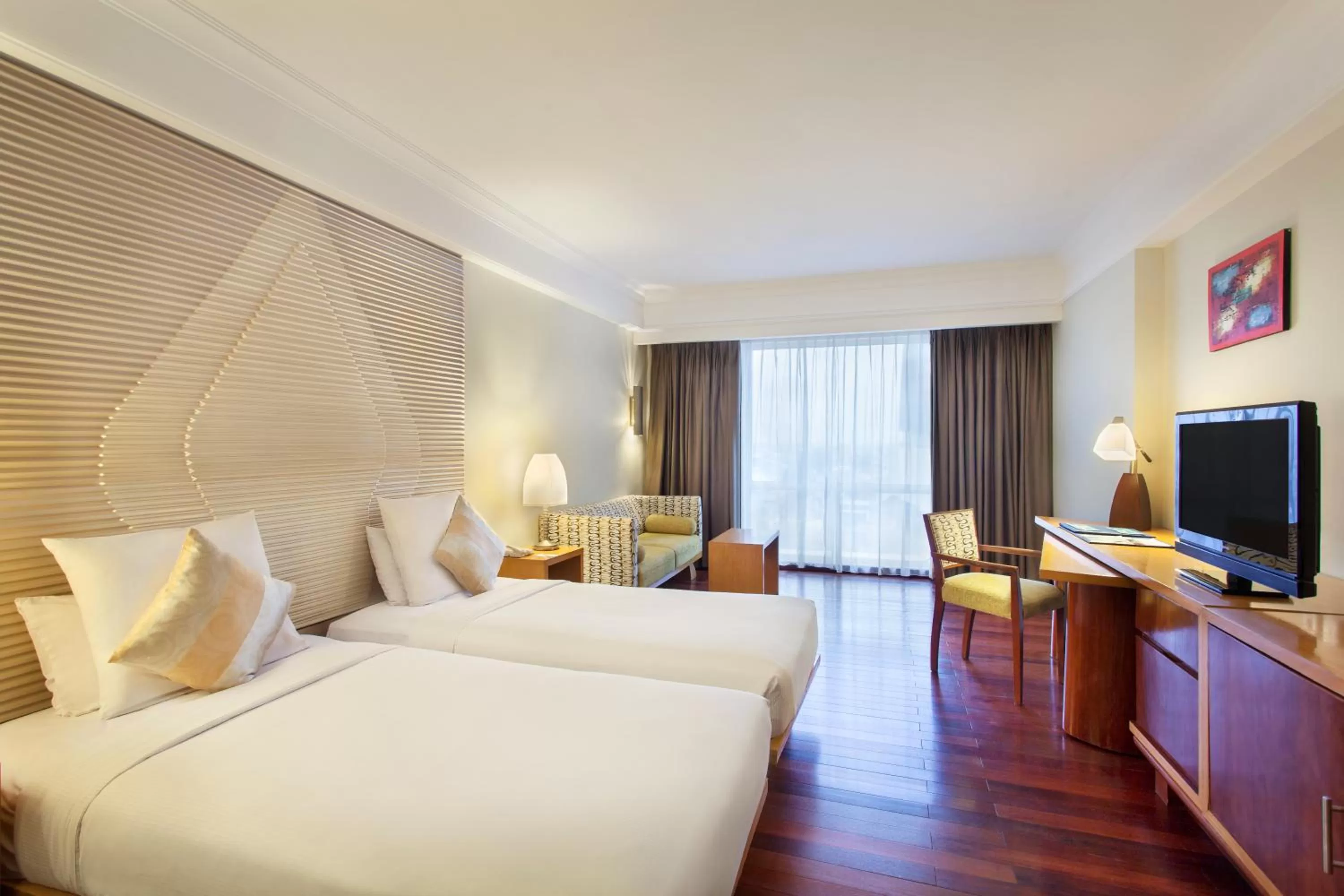 Photo of the whole room, Bed in Novotel Semarang