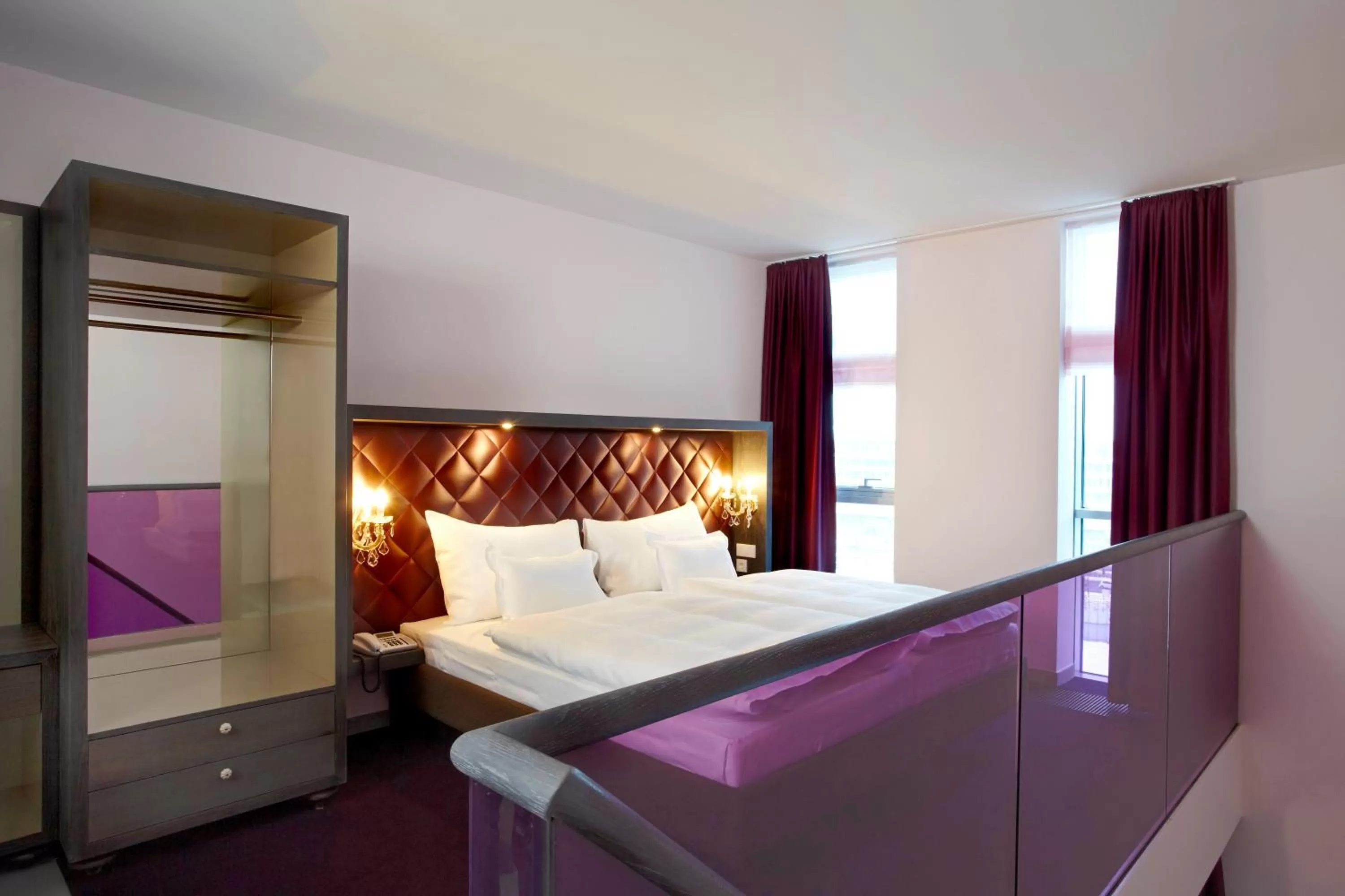 Photo of the whole room, Bed in abito Suites