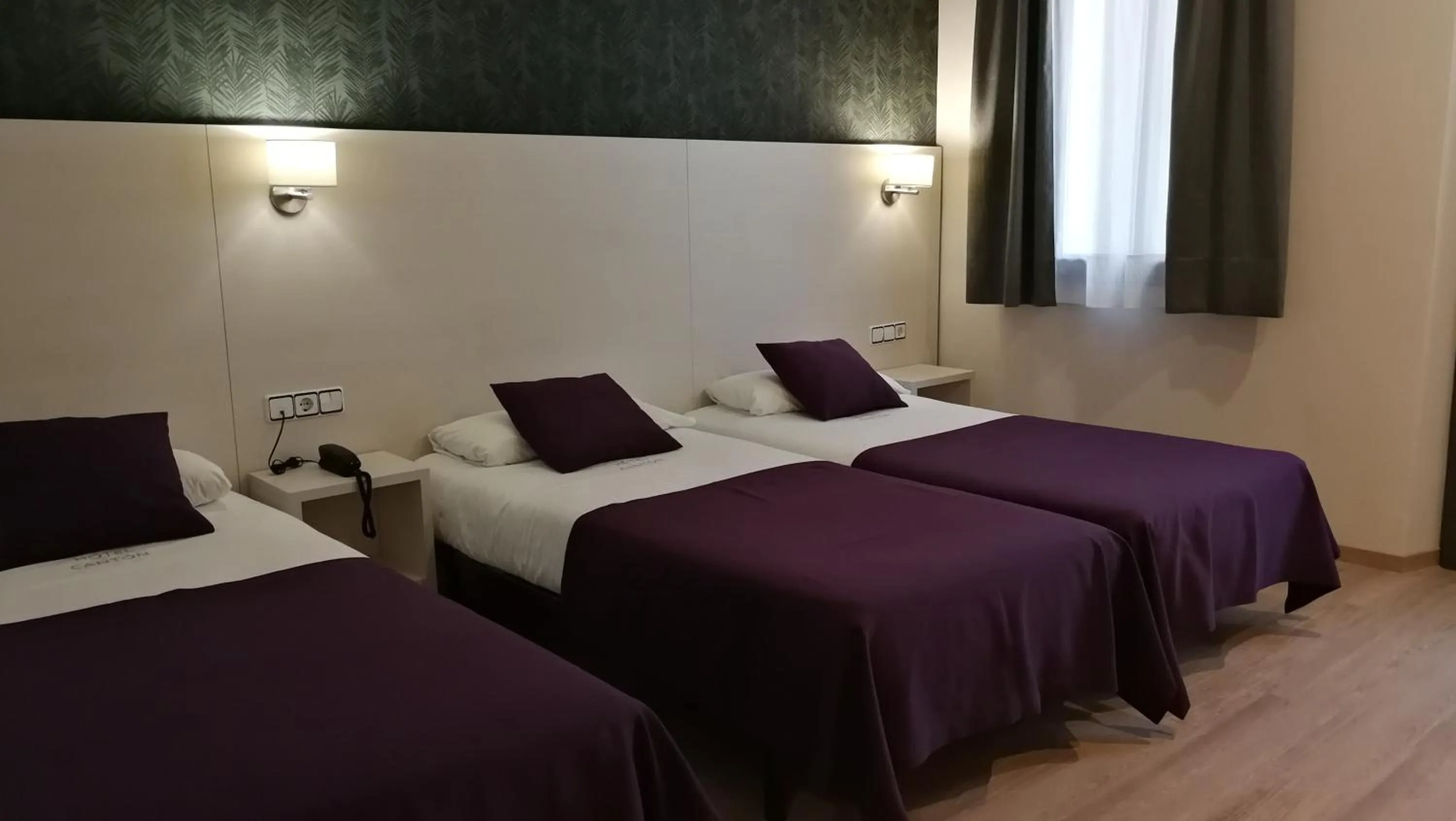 Bed in Hotel Cantón