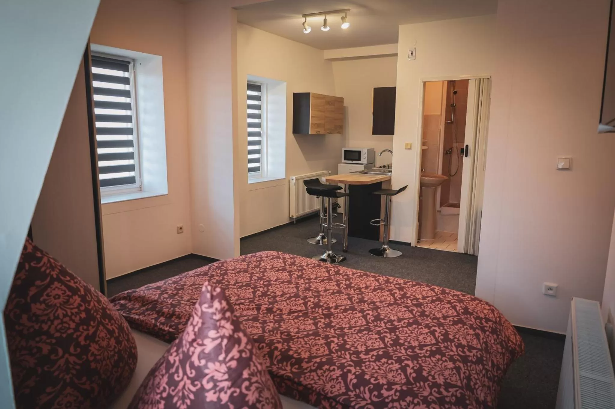 Bed in Hotel Apartment Faraon