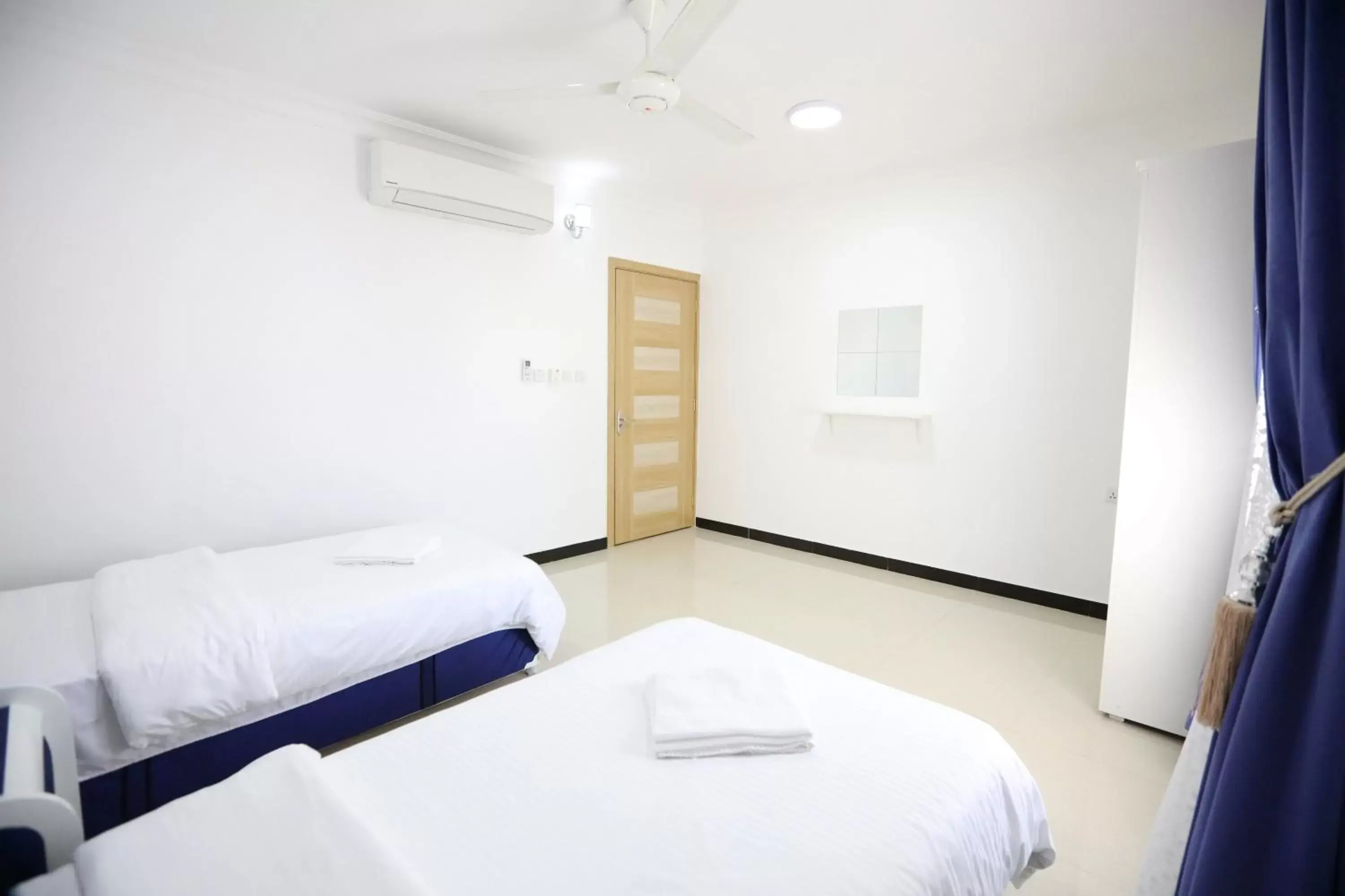 Deluxe Double Room (2 Adults + 1 Child) in Al Rayyan Hotel Apartments Muscat Deluxe Double Room (2 Adults + 1 Child) in Al Rayyan Hotel Apartments Muscat