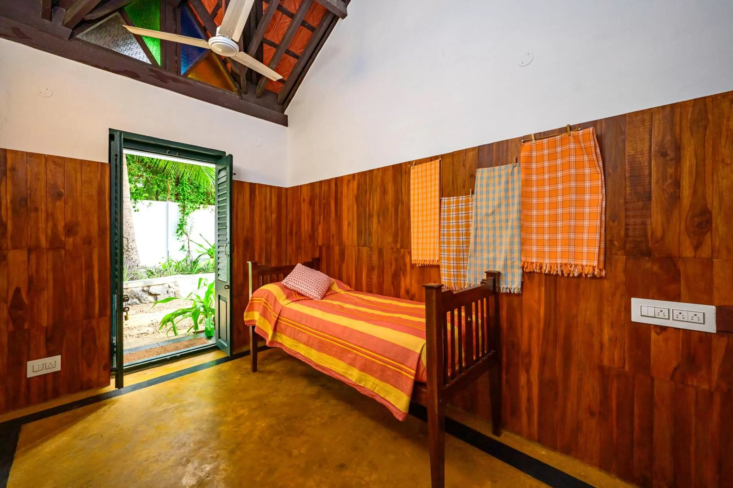 Bed in Neemrana's Coconut Alley