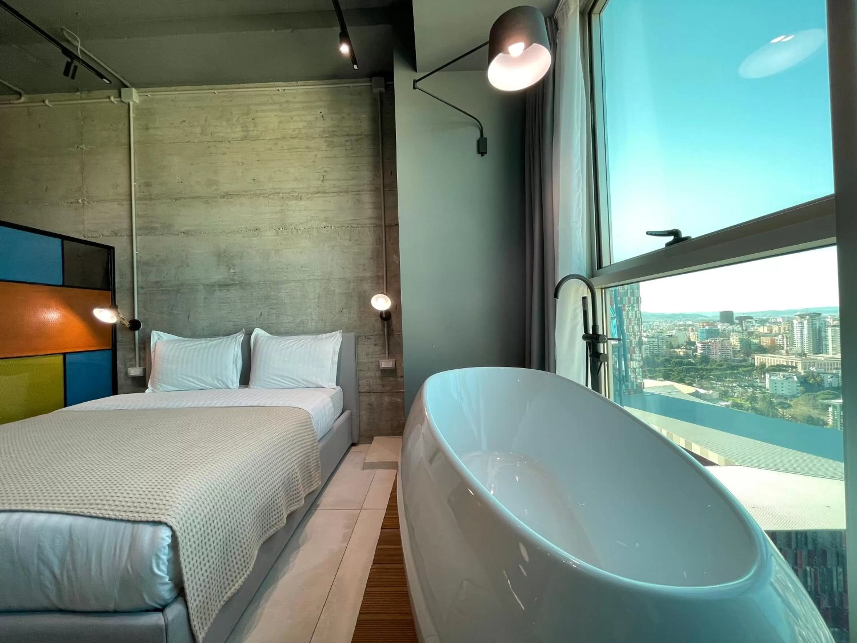 Bed in Ambassador Skyline Apartments