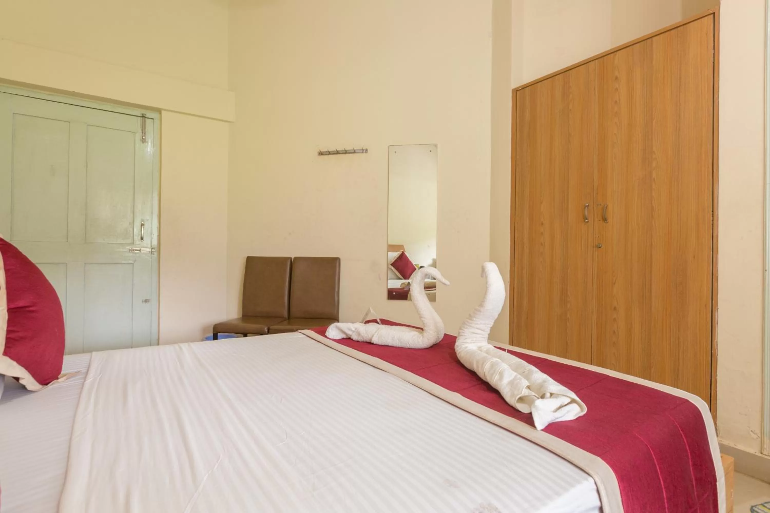 Bed in KSTDC Hotel Mayura TalaKaveri, Bhagamandala