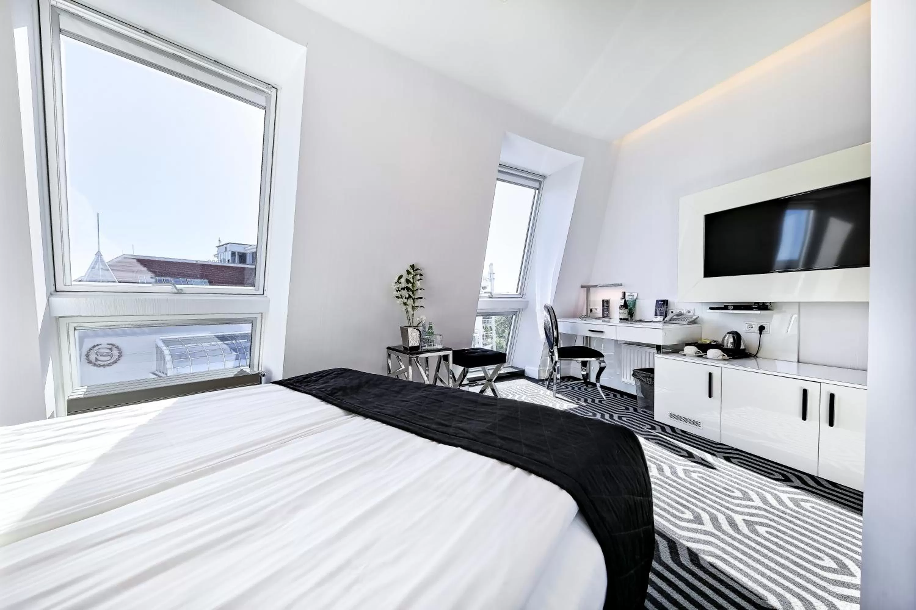 Bed in Bayjonn Boutique Hotel