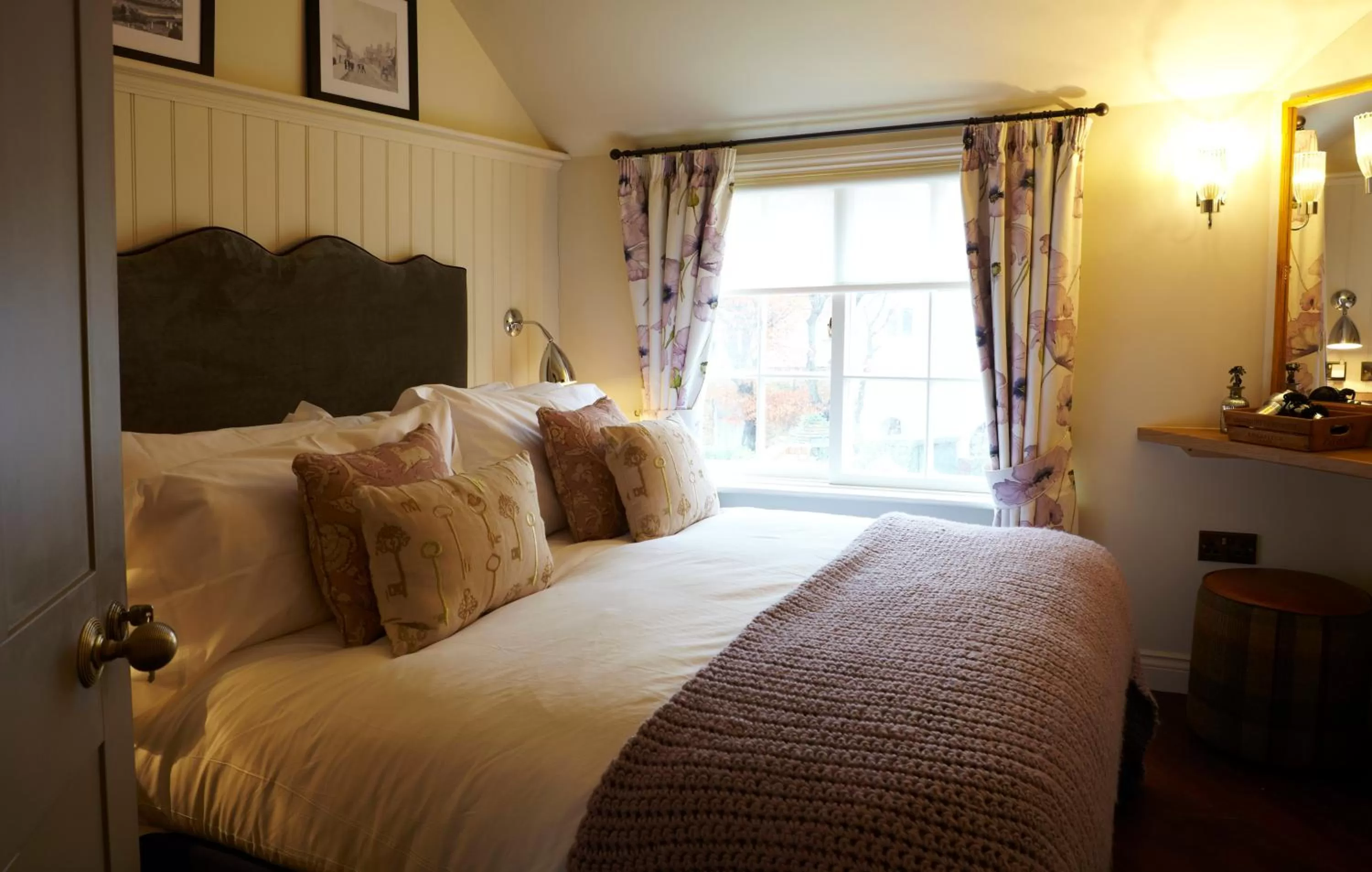 Decorative detail, Bed in The Plough Inn & Cottages