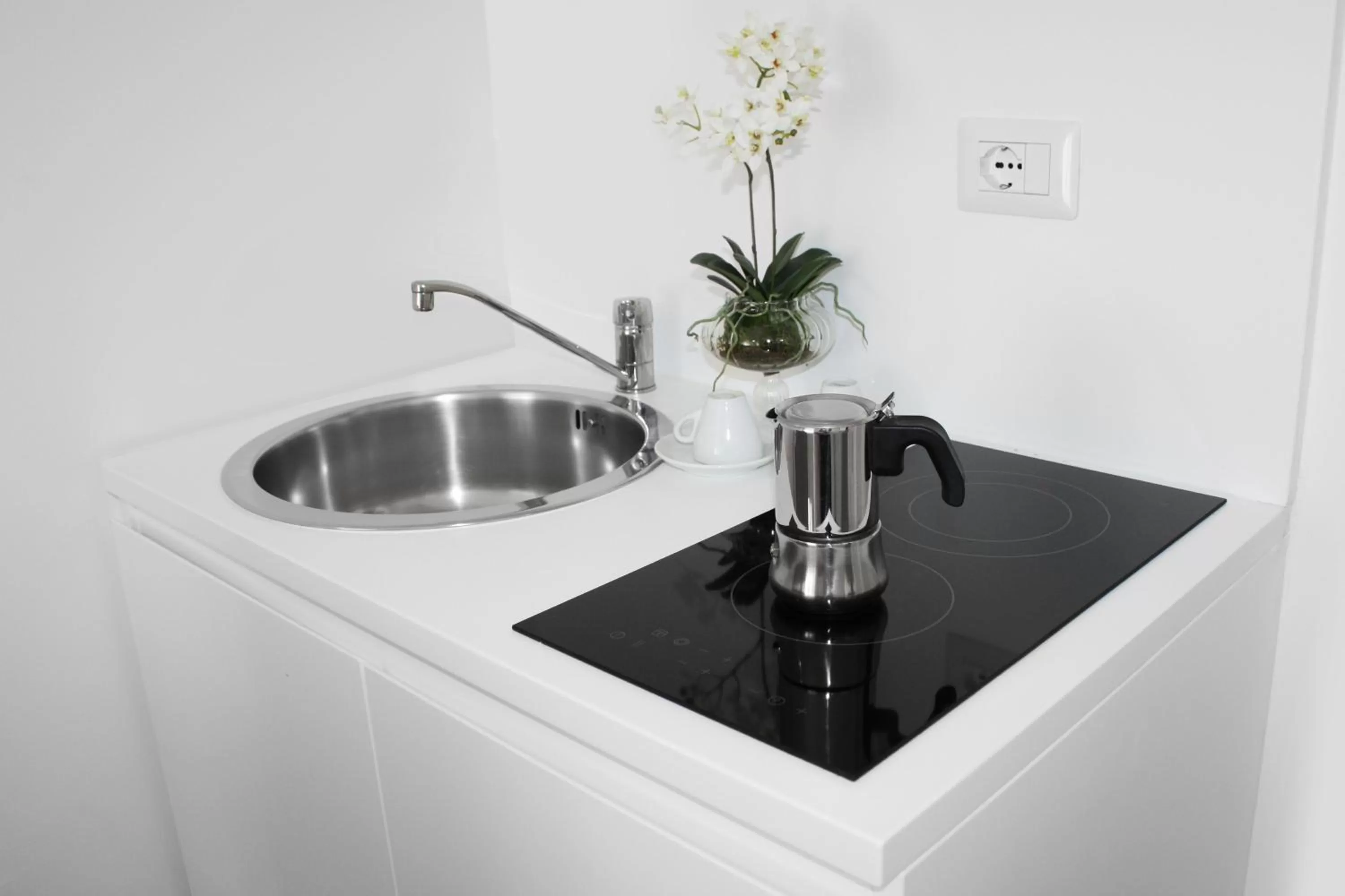 Kitchen or kitchenette in Roma Resort Colosseum