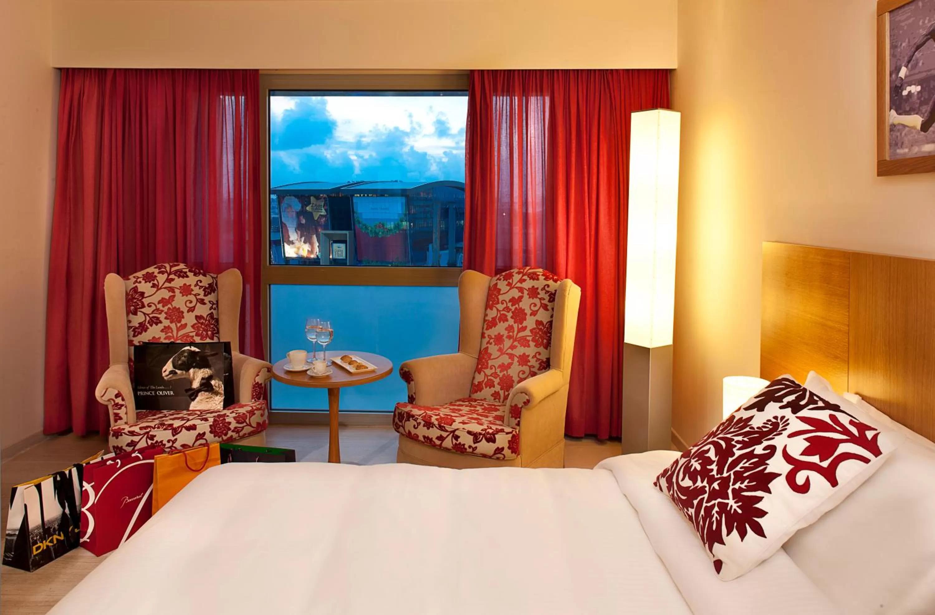 Bed, Seating Area in Civitel Olympic