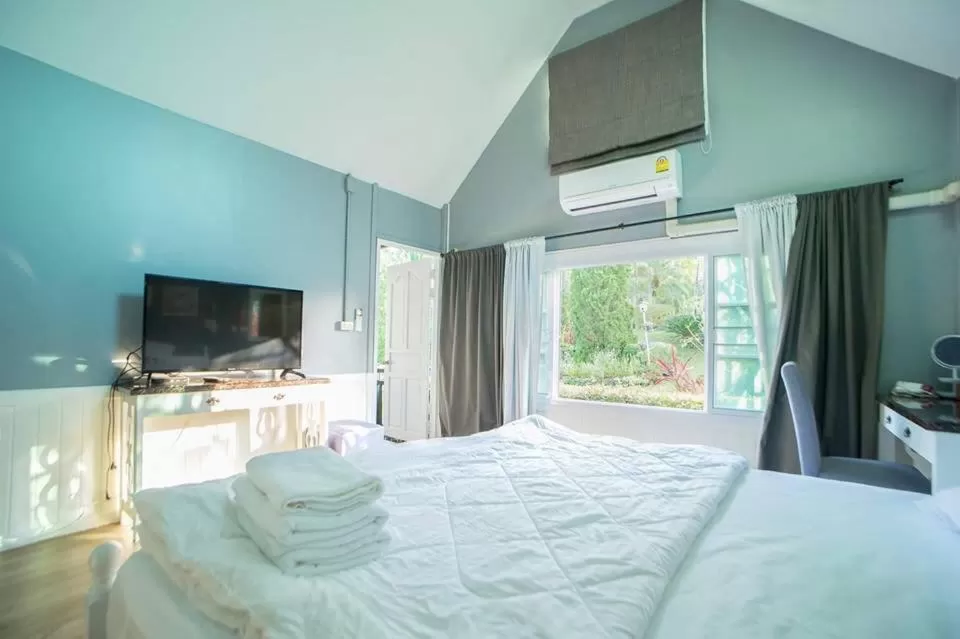 Bed in Baan JaoKorKluay บ้านเจ้ากอกล้วย