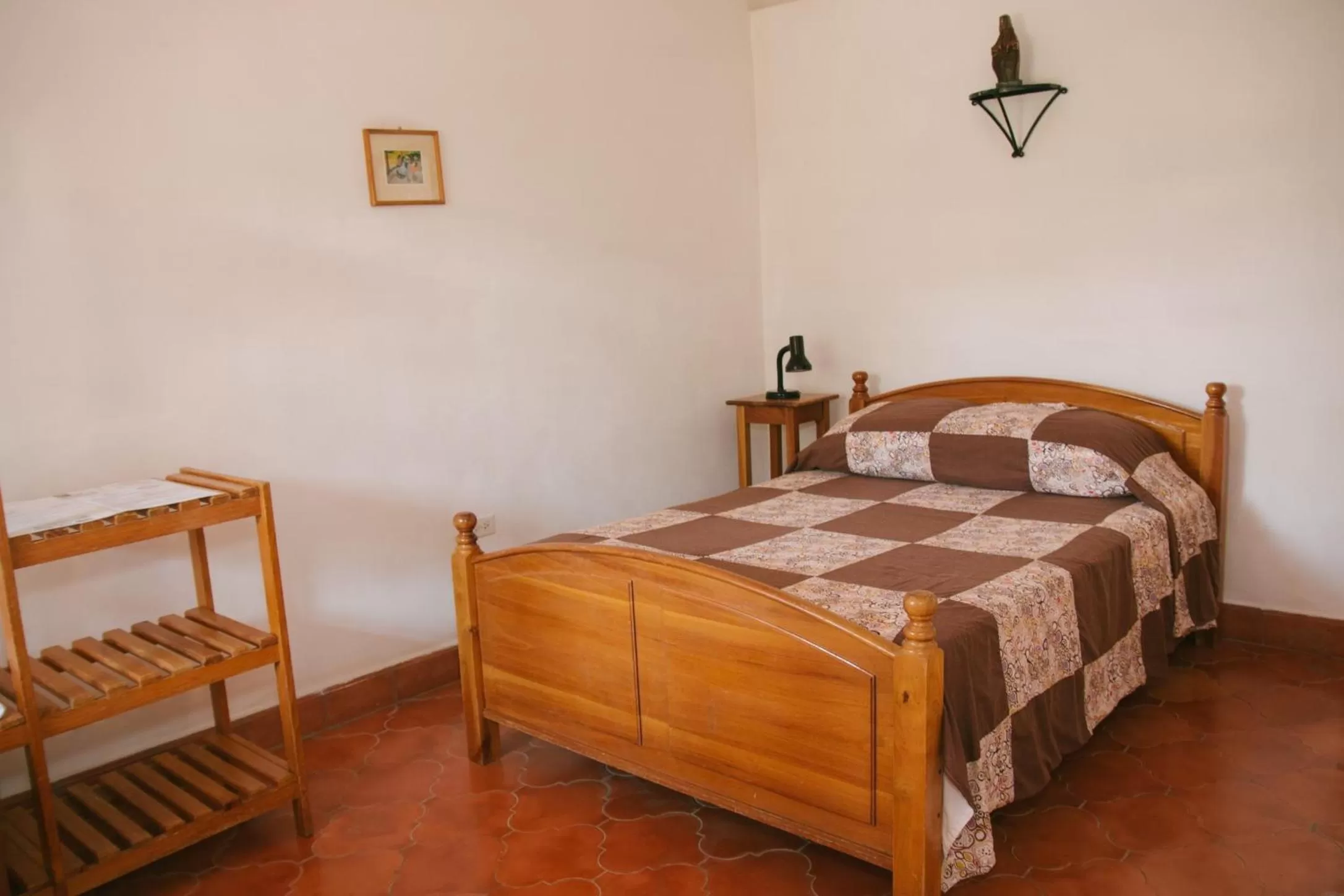 Bed in La Casa de Cafe Bed and Breakfast