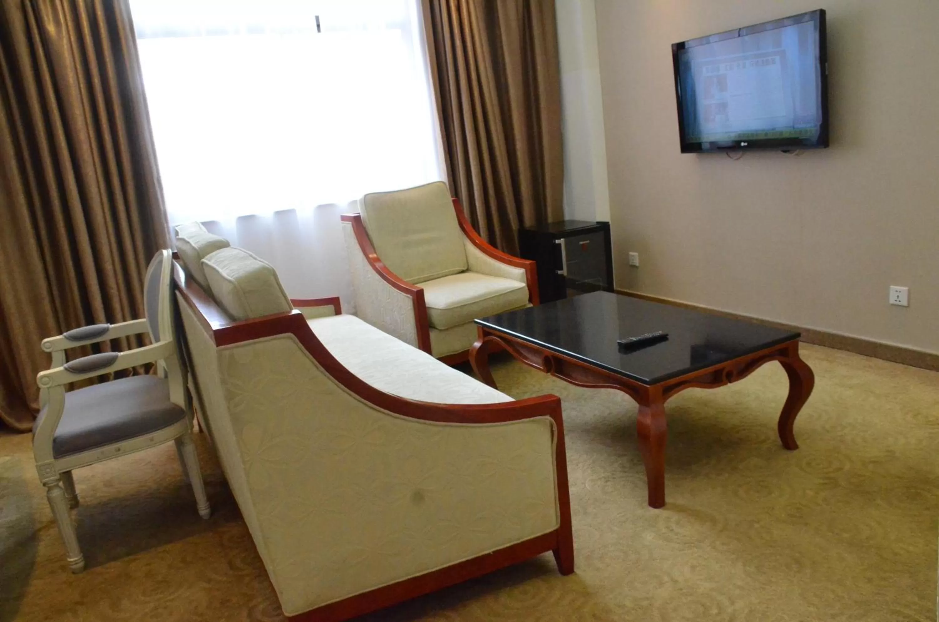TV/Entertainment Center in Soluxe Club International Hotel