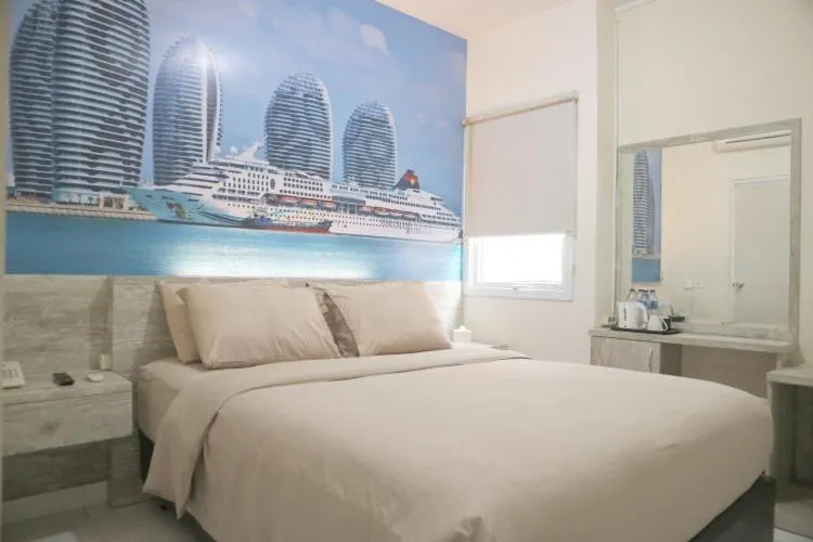 Bed in De Green Inn at Aeropolis