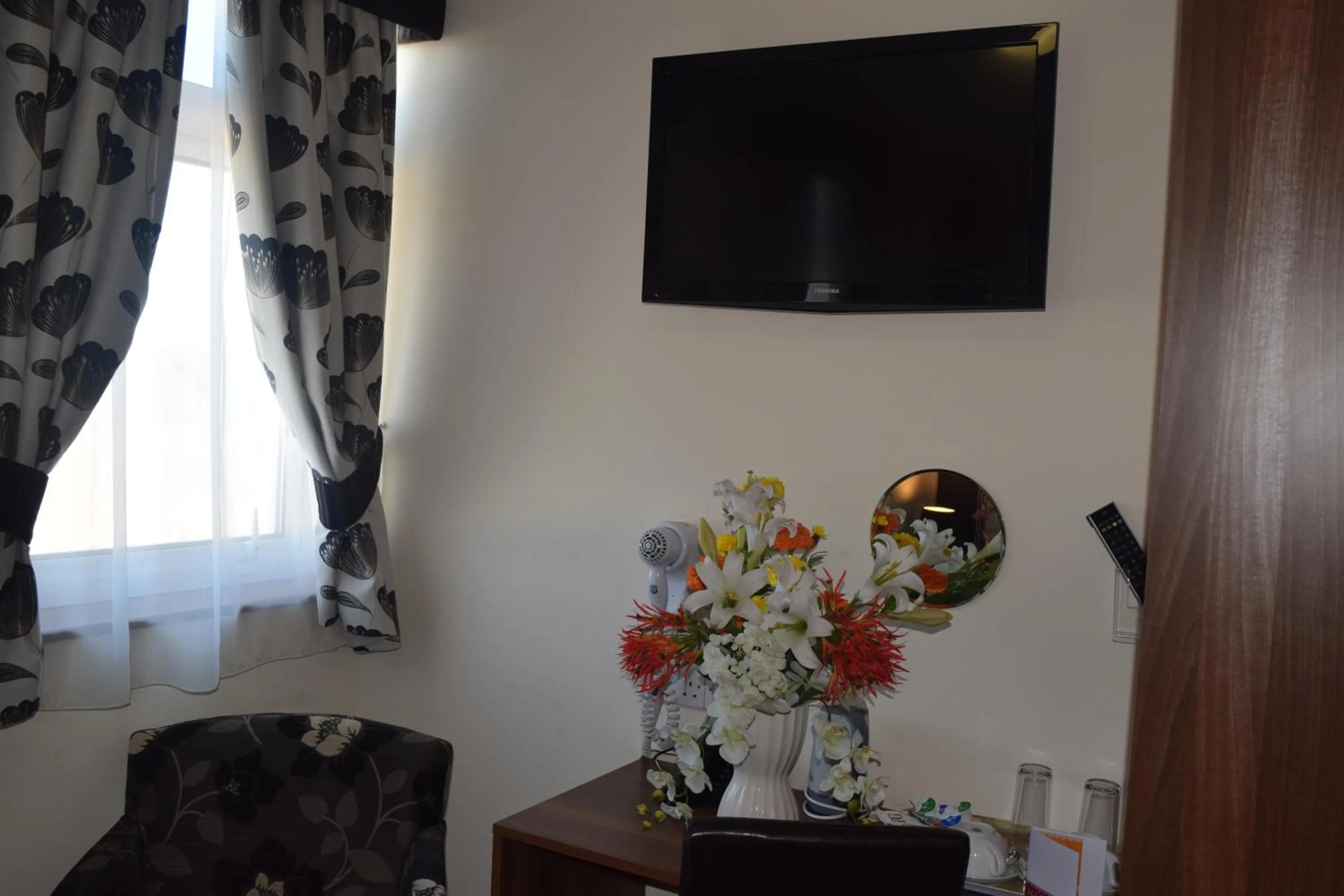 TV and multimedia in Star Anglia Hotel City Center by OYO