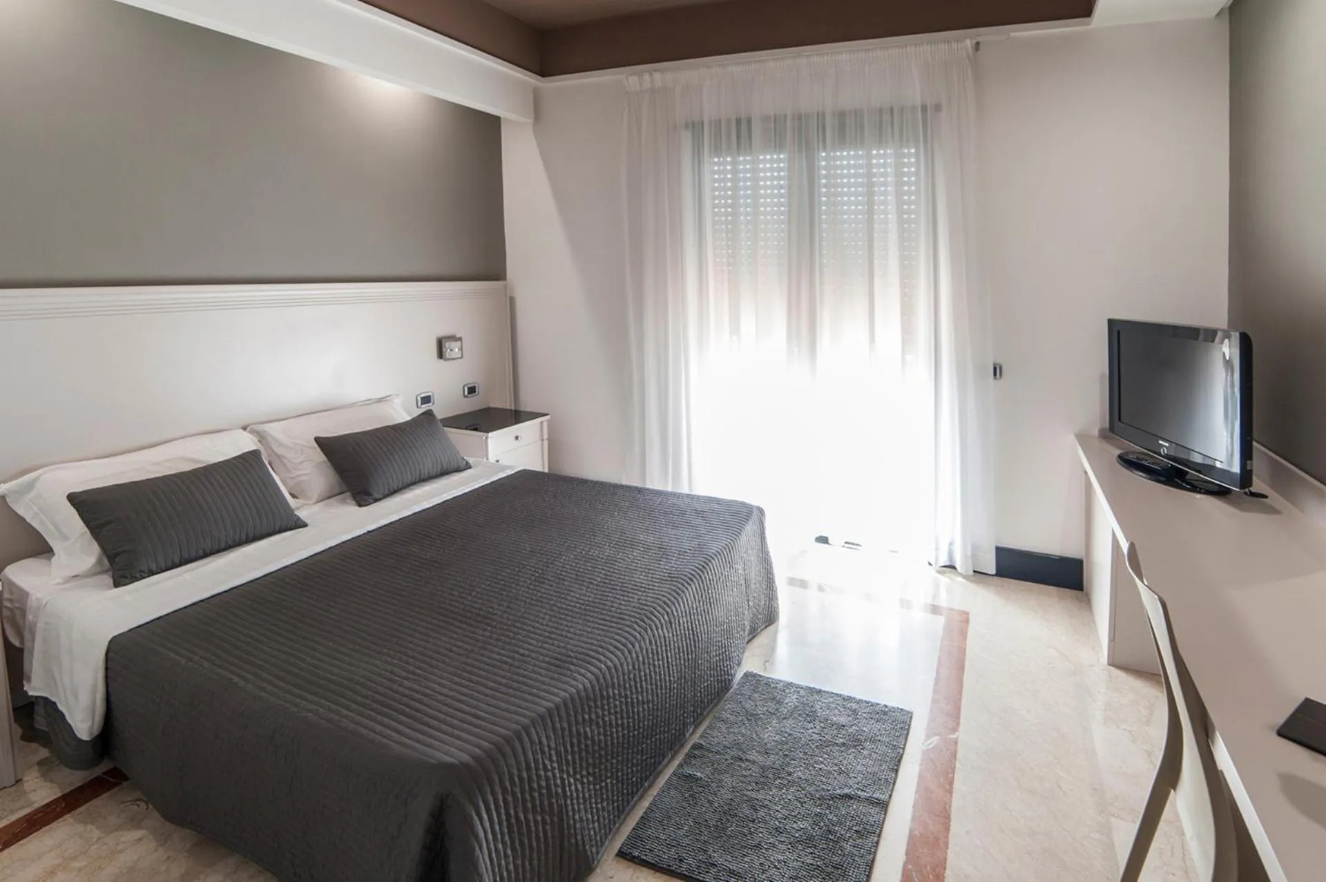 Bed in Hotel Giulia Ocean Club