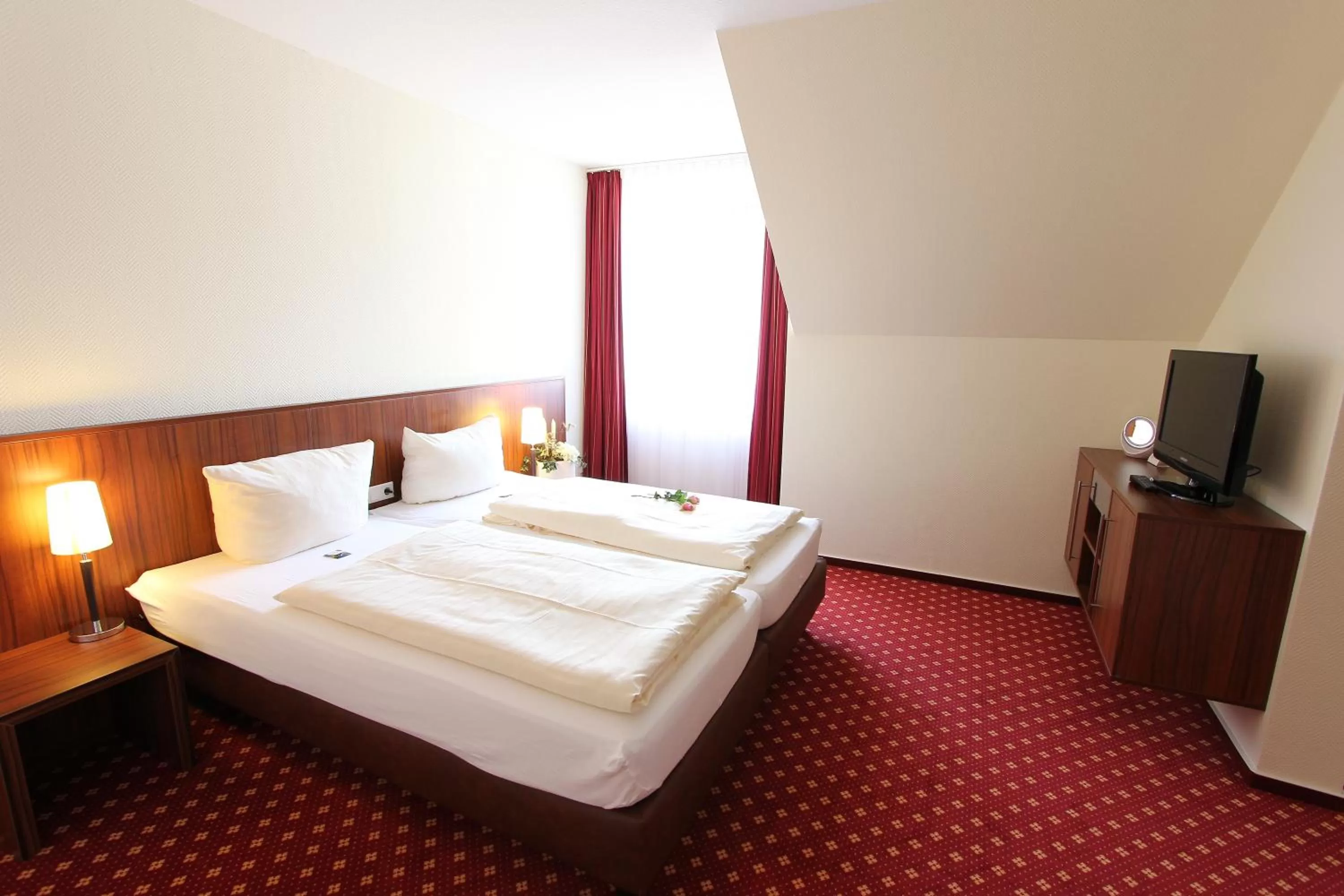 Photo of the whole room, Bed in Akzent Hotel Jonathan