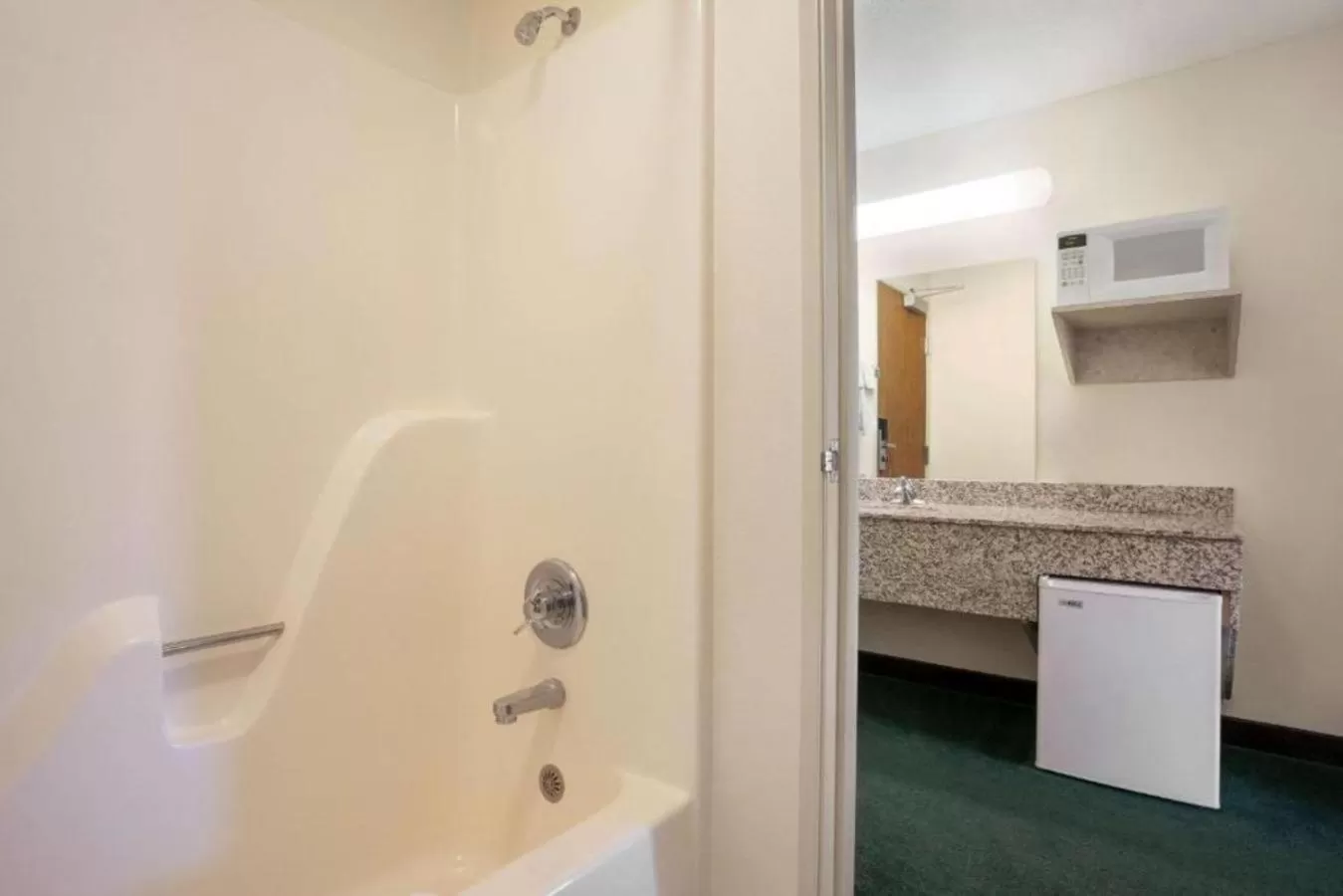 Bathroom in Travelodge by Wyndham Morrill