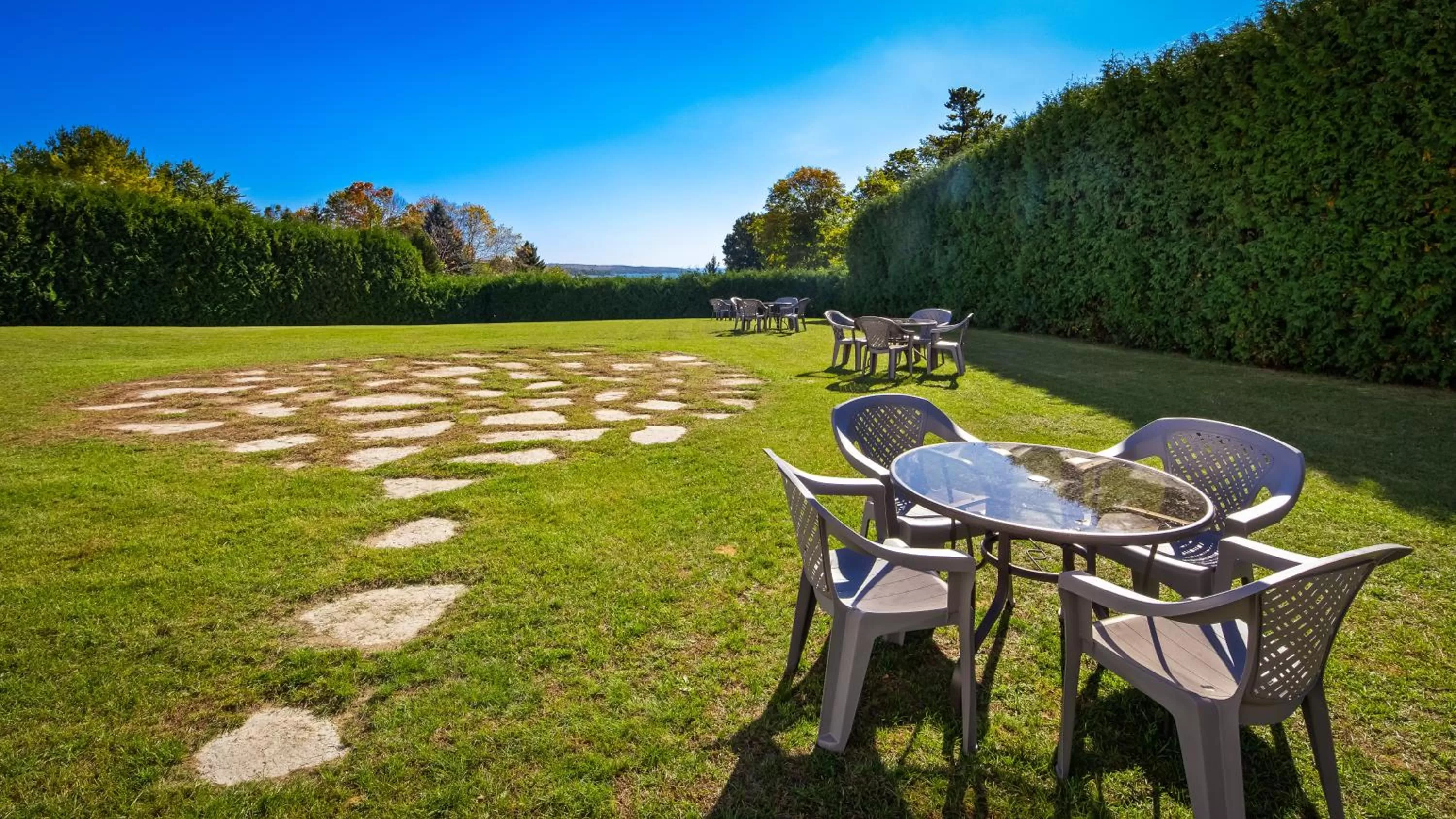 Patio in Charlevoix Inn & Suites SureStay Collection by Best Western