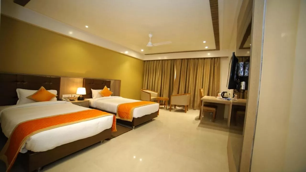 Bed in Dhamma Grand Hotel Resort