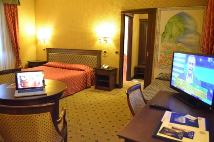 Bed in Hotel Don Carlo