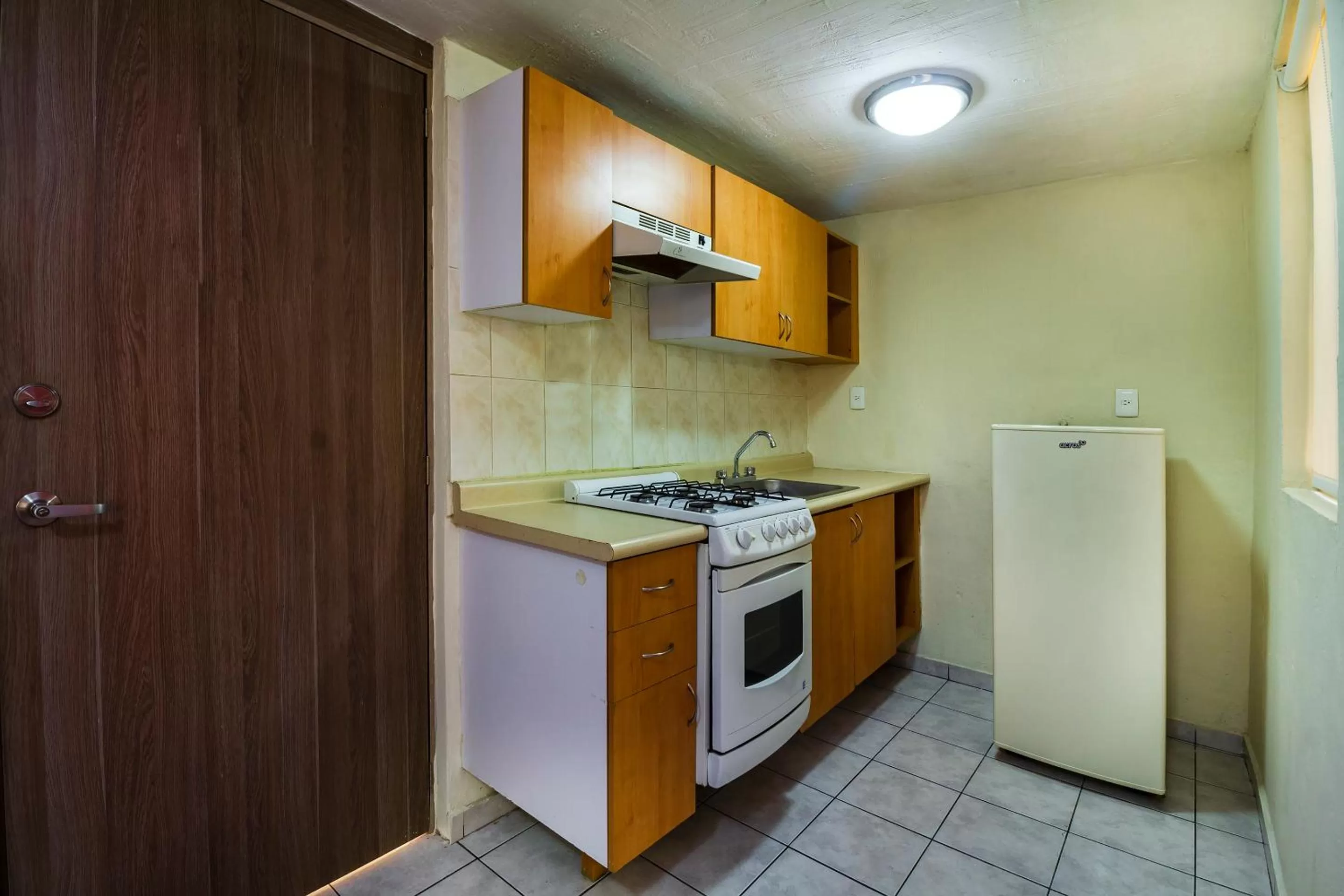 Kitchen or kitchenette in Suites Navata