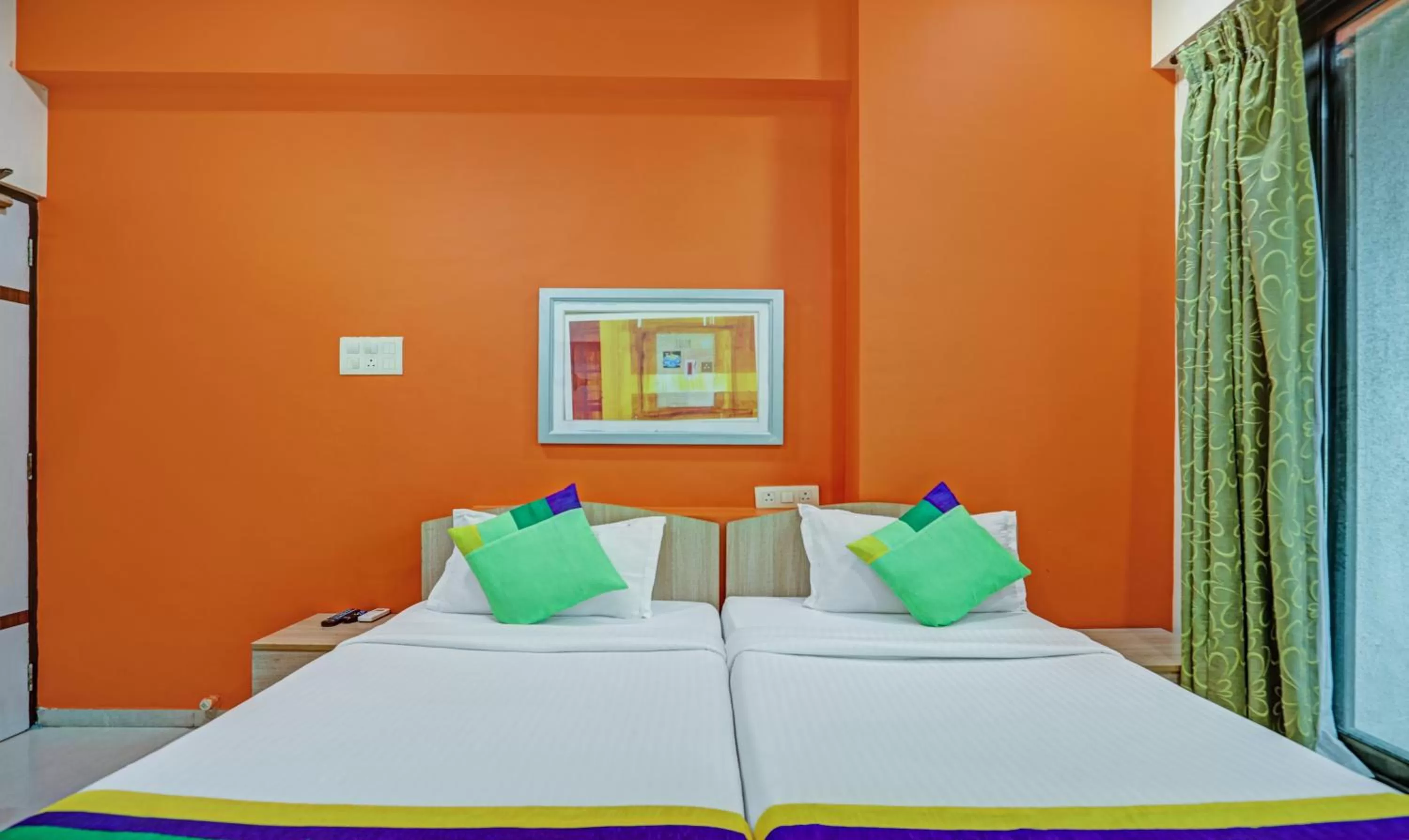 Bed in Treebo Trend Welcome Apartments