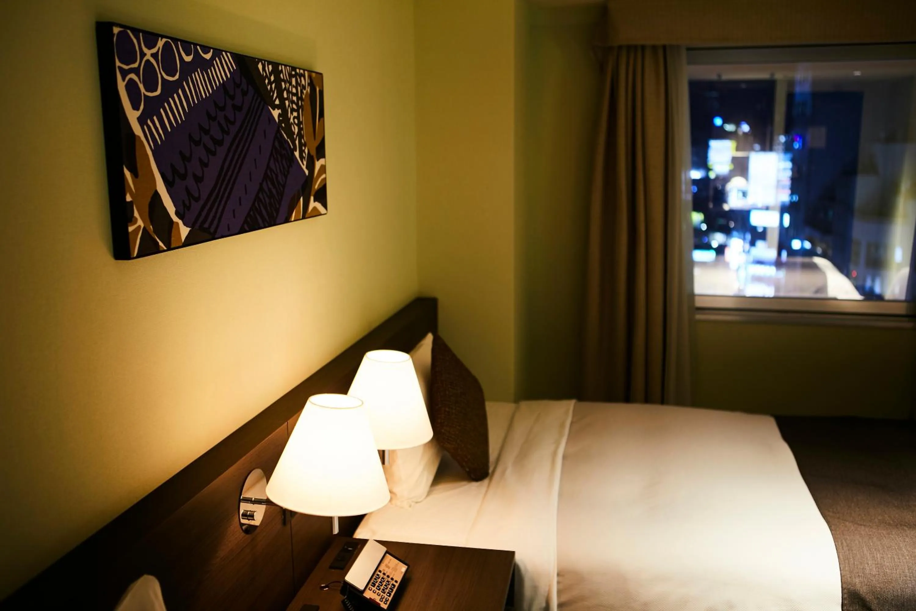 Bed in Ginza Grand Hotel