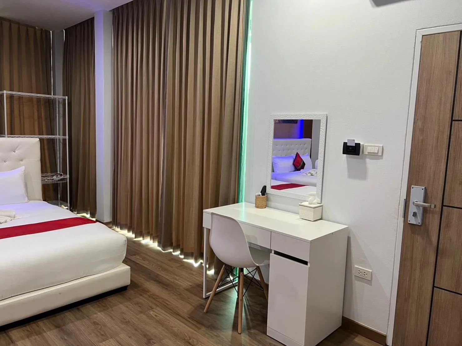 Bed in River Grand Hotel