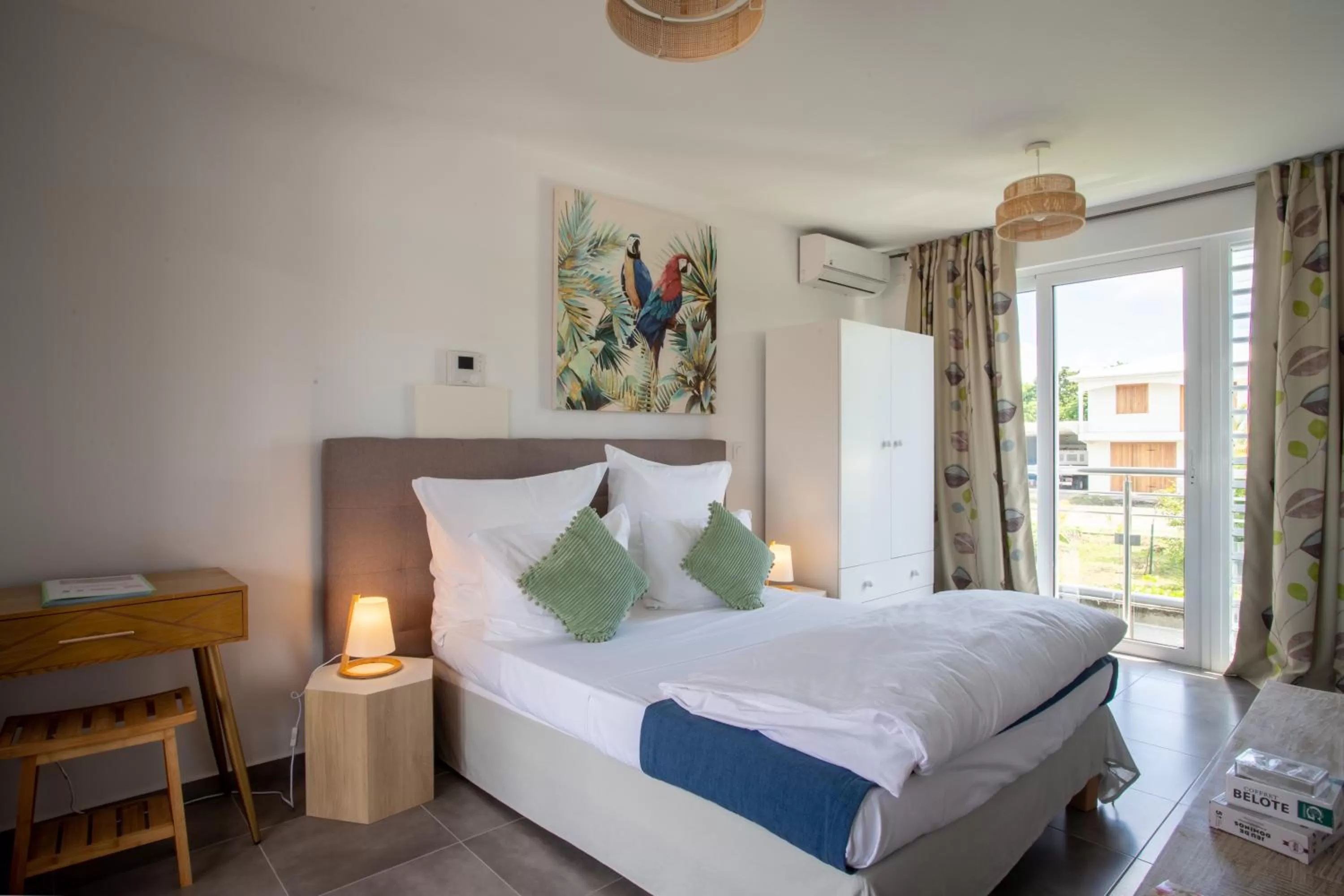 Bed in Hôtel Guadeloupe Palm Suites