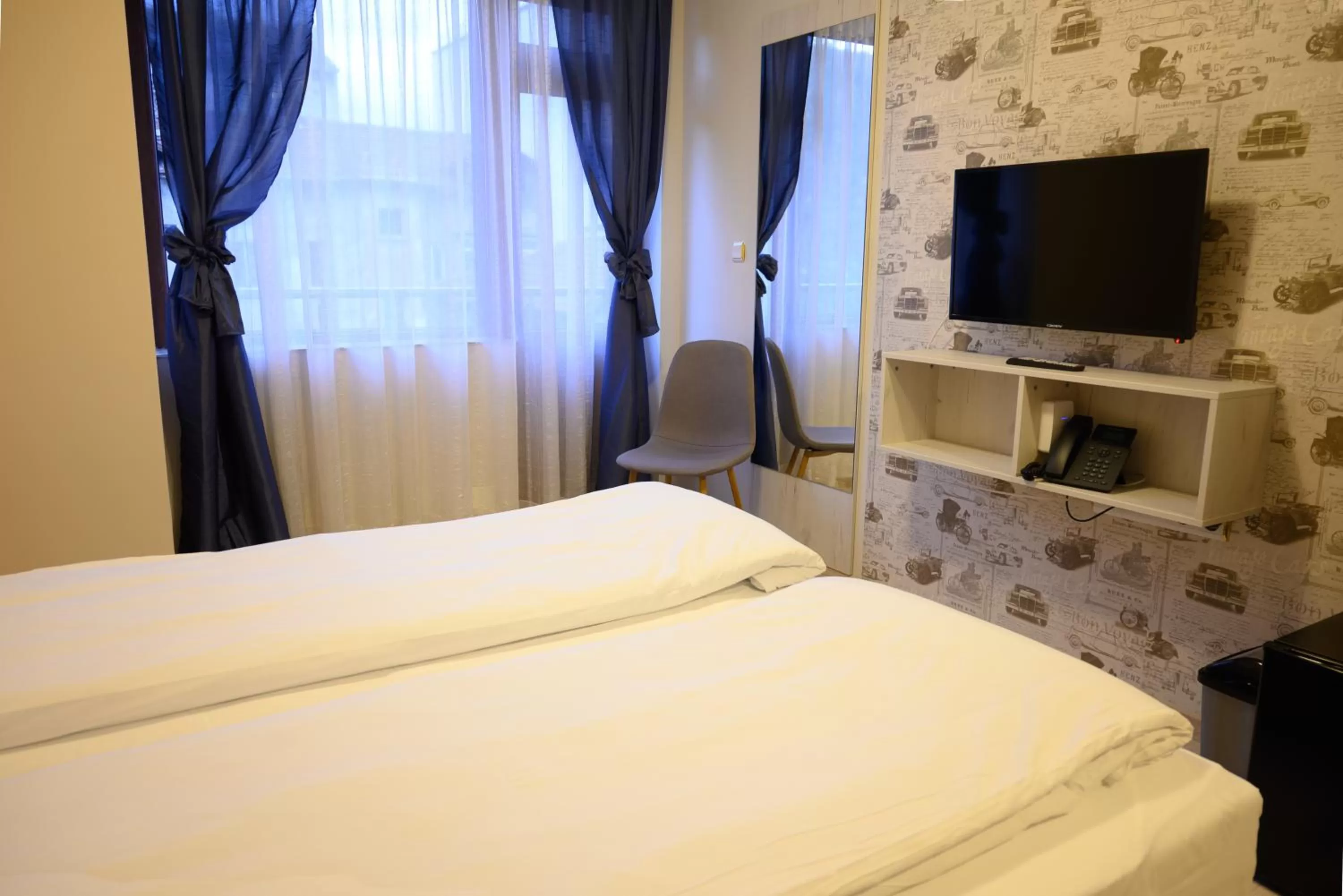 TV and multimedia, Bed in Hotel Leda