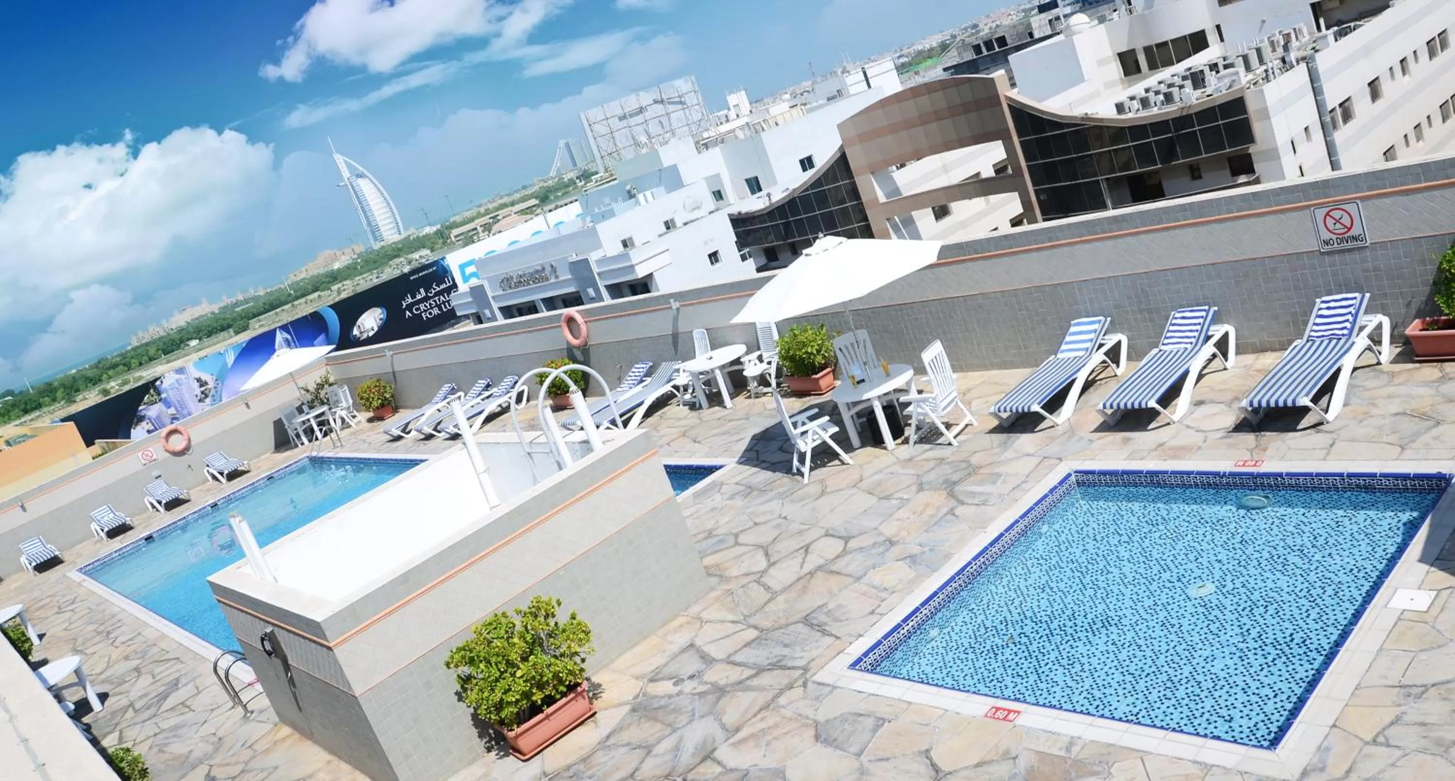 Swimming pool in Rose Garden Hotel Apartments - Al Barsha, Near Metro Station