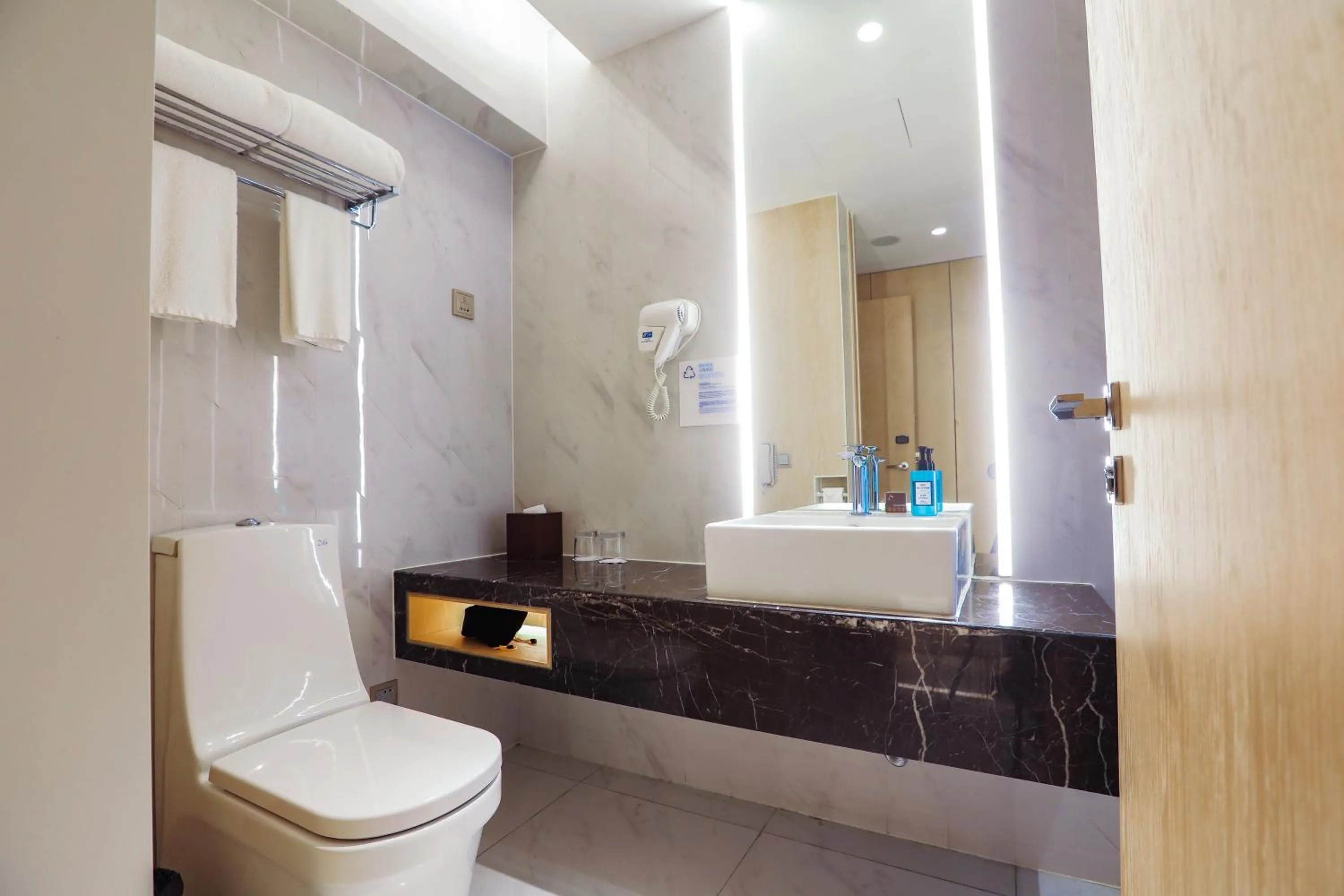 Bathroom in Holiday Inn Express Shanghai Songjiang Fangta by IHG