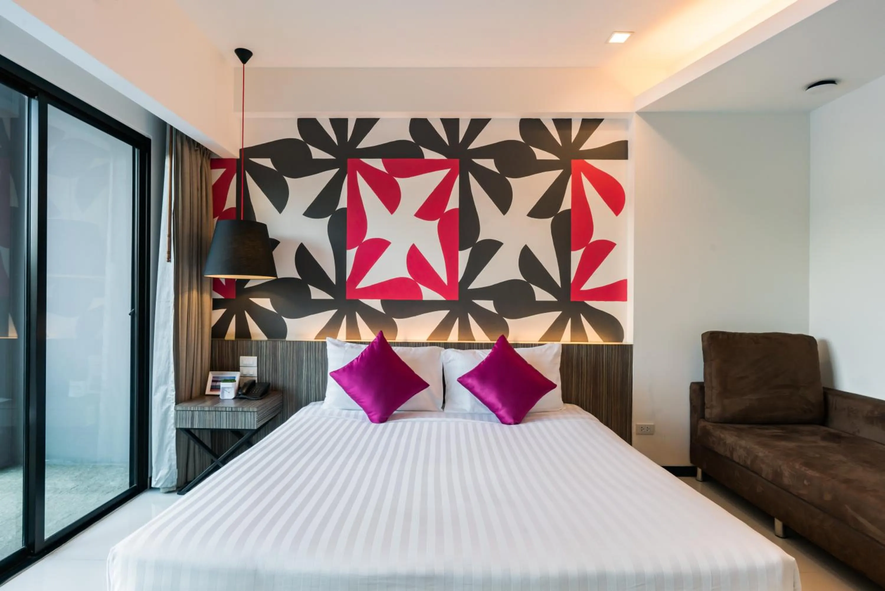 Bed in Hotel J Residence Pattaya