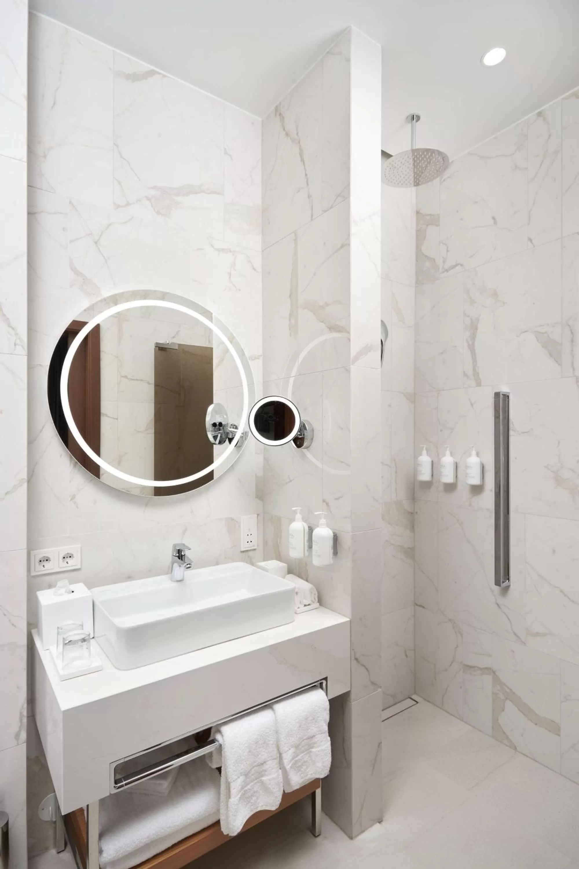 Bathroom in Iceland Parliament Hotel, Curio Collection By Hilton