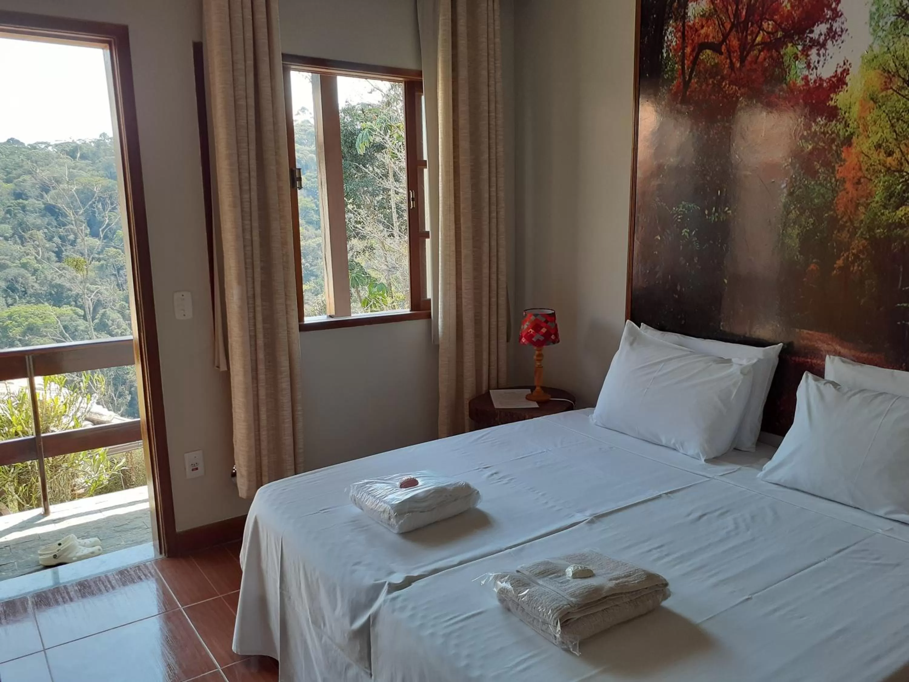 Bed in Pousada R.N.C. Nosso Paraíso