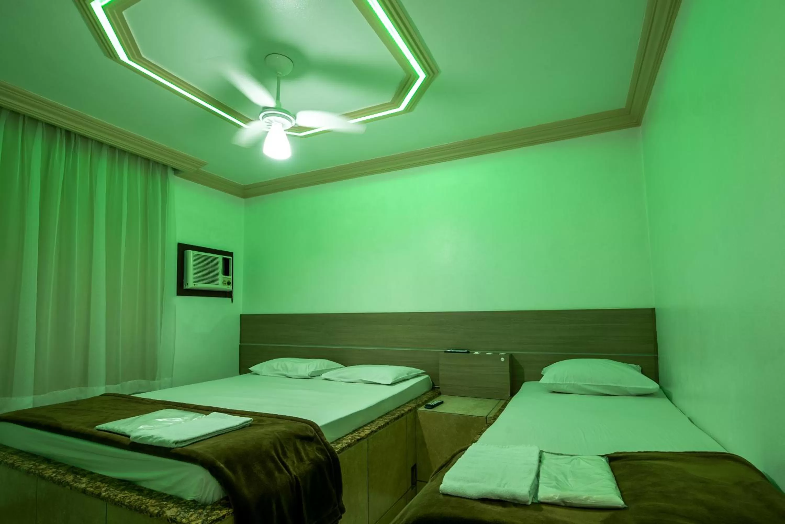 Bedroom in Classic Hotel e Motel