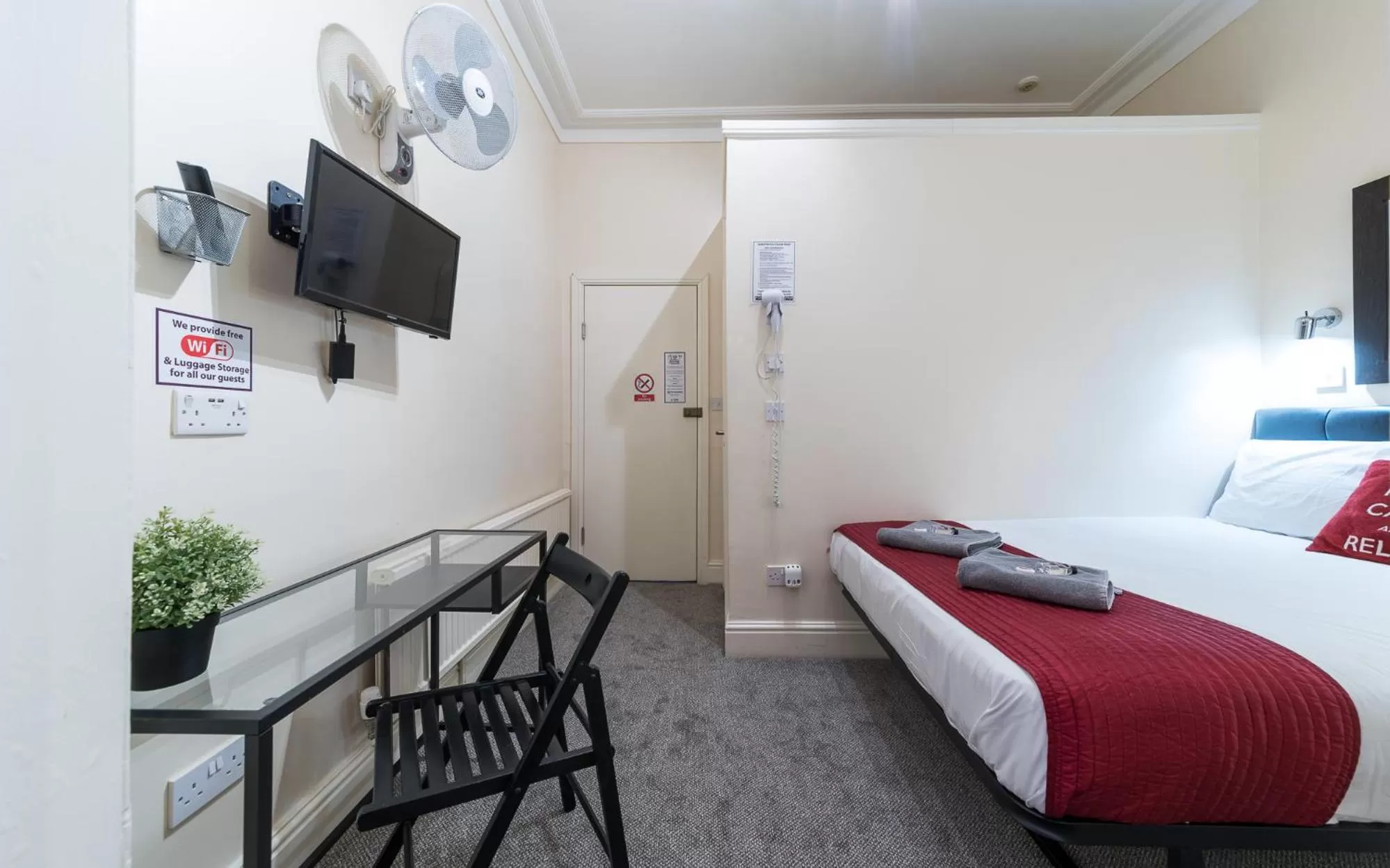 Bed in Hellenic Hotel by Saba